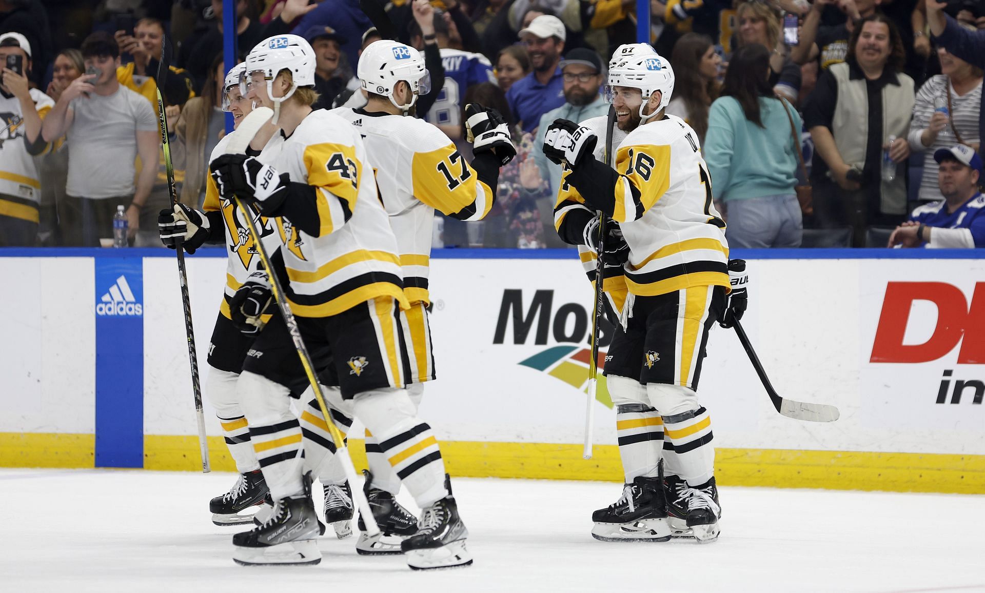 Pittsburgh Penguins players celebrating a goal