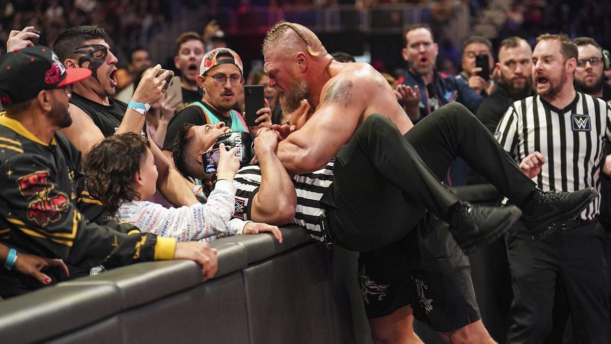 Brock Lesnar attacking referee Eddie Orengo at WWE Royal Rumble 2023.