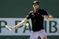 Hubert Hurkacz attempts to strike the ball at the BNP Paribas Open