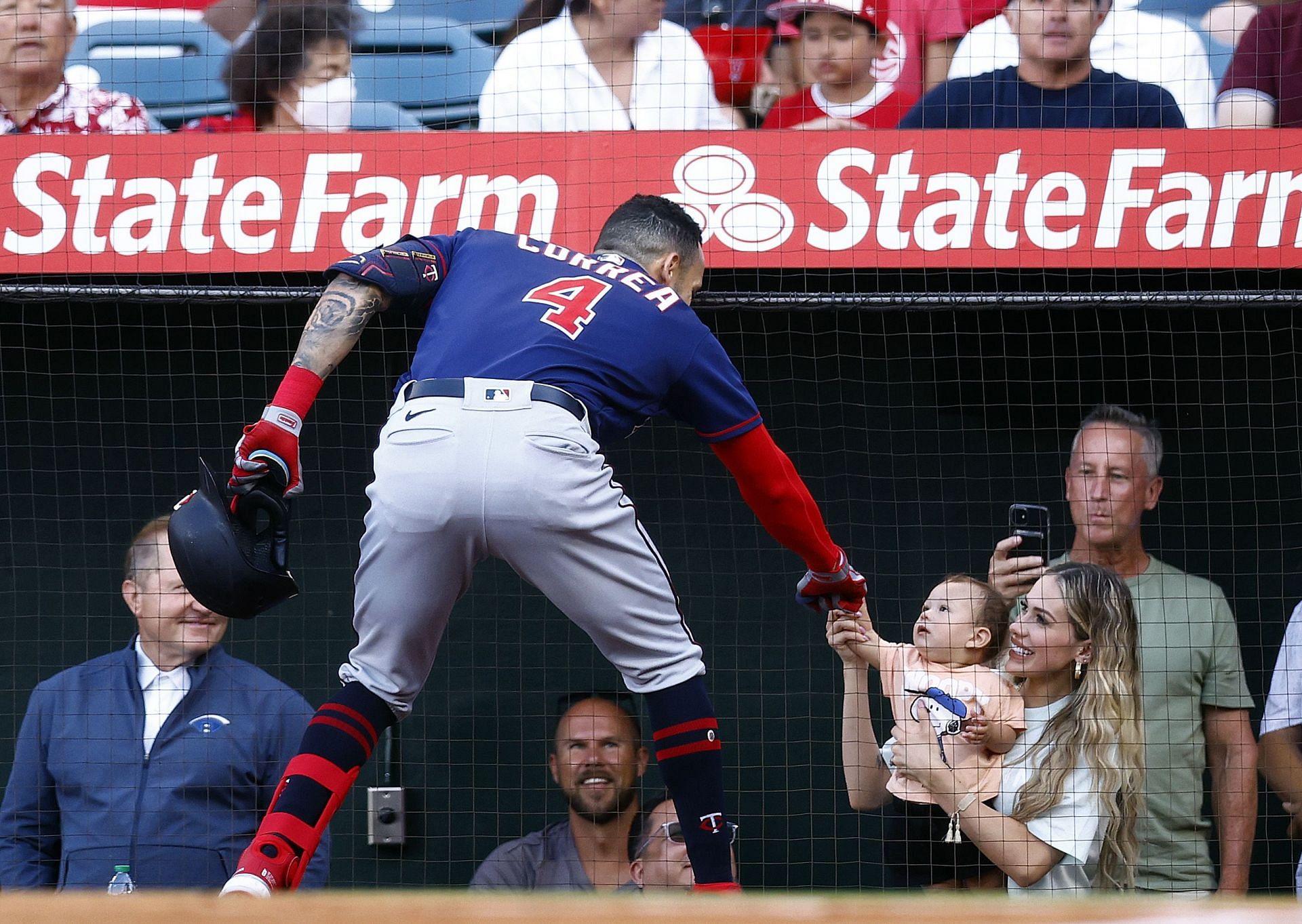 Minnesota Twins v Los Angeles Angels: ANAHEIM, CALIFORNIA - AUGUST 13: Carlos Correa #4 of the Minnesota Twins celebrates a home run with his wife Daniella Rodriguez, and son, Kylo in the first inning against the Los Angeles Angels at Angel Stadium of Anaheim on August 13, 2022, in Anaheim, California. (Photo by Ronald Martinez/Getty Images)