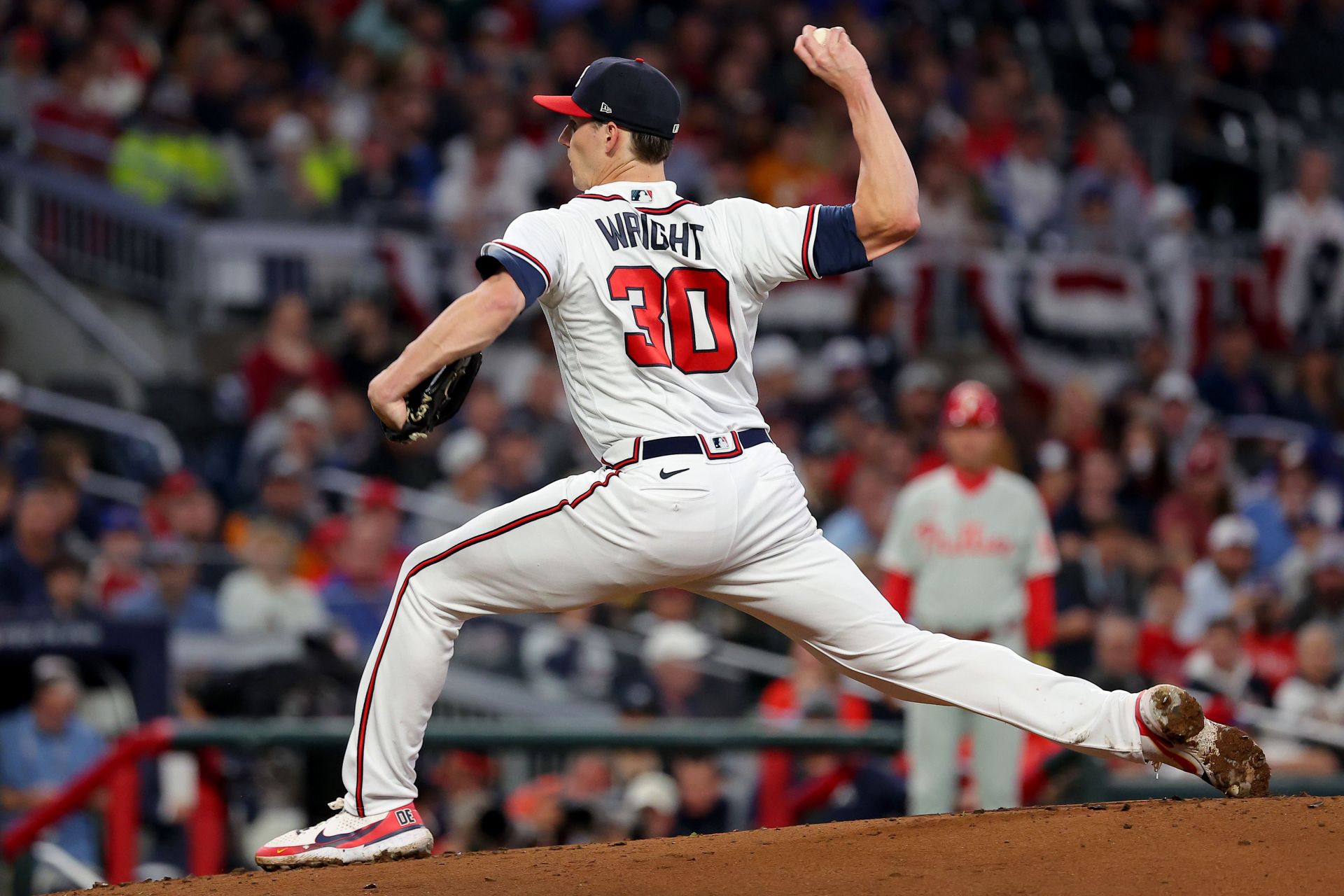 Kyle Wright #30 of the Atlanta Braves delivers a pitch against the Philadelphia Phillies during the first inning in game two of the National League Division Series at Truist Park on October 12, 2022 in Atlanta, Georgia.