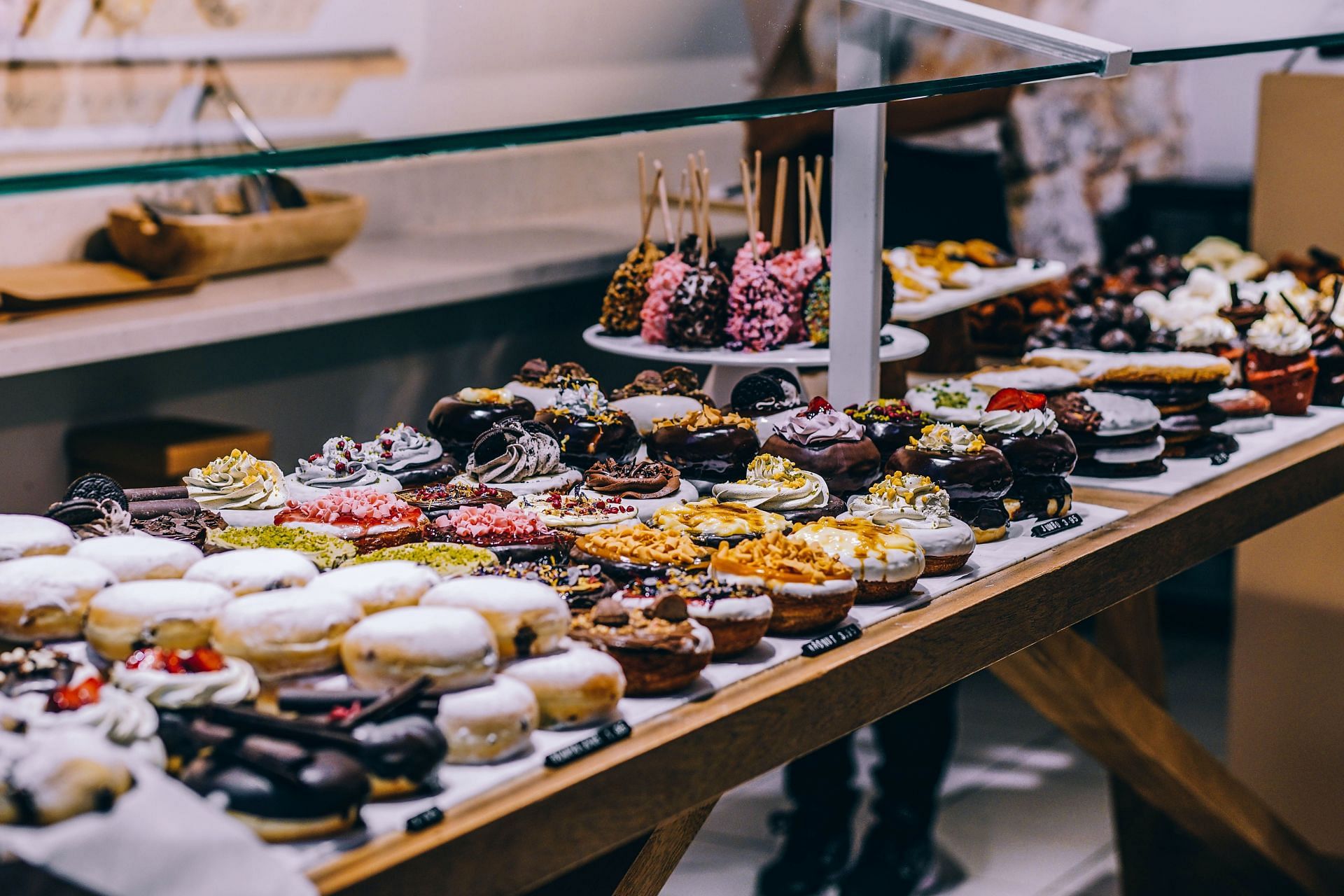 Image of various sugary snacks - be mindful of your sugar intake for better health (Image via Pexels)