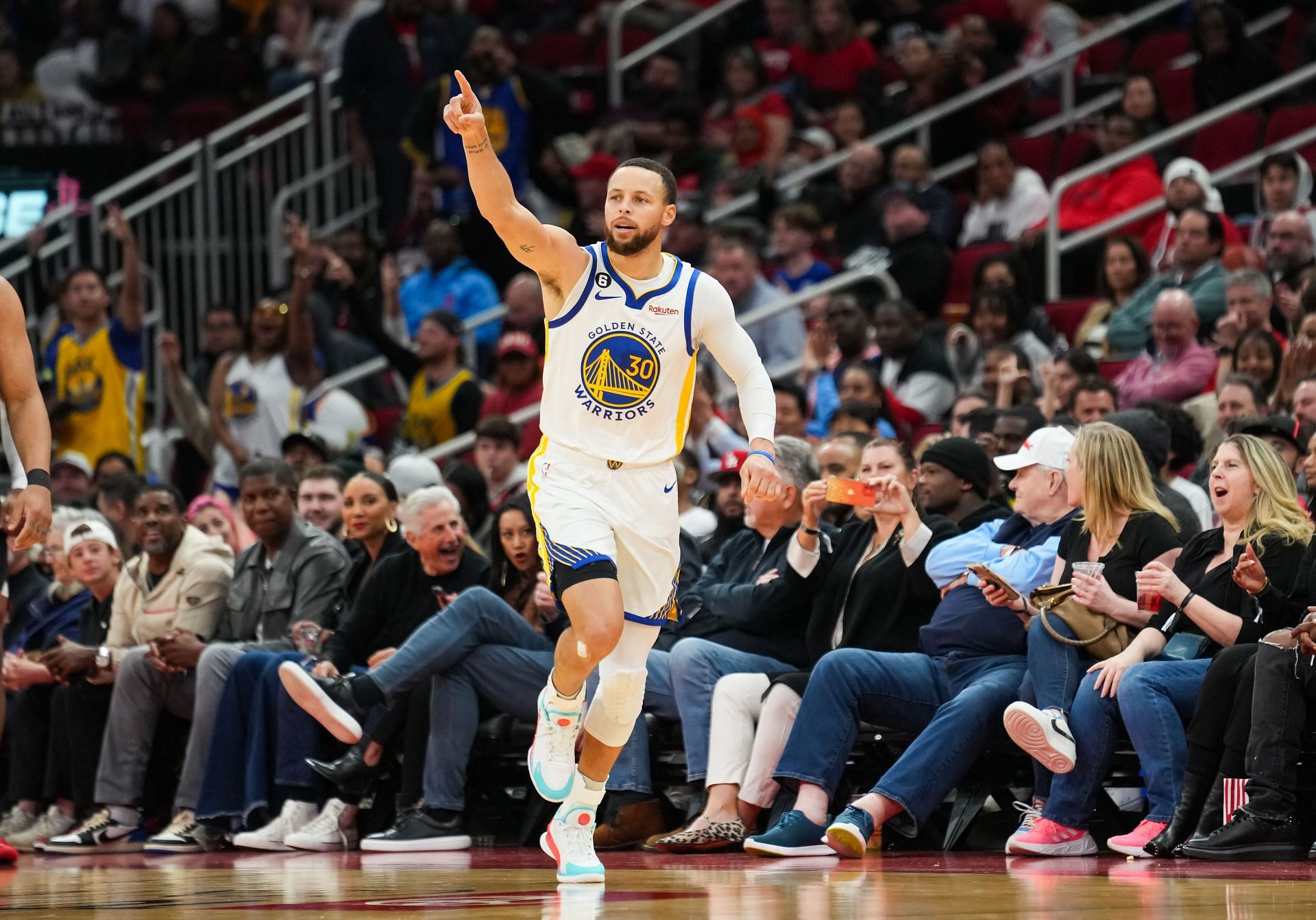 Stephen Curry #30 of the Golden State Warriors reacts after making a three-point shot against the Houston Rockets