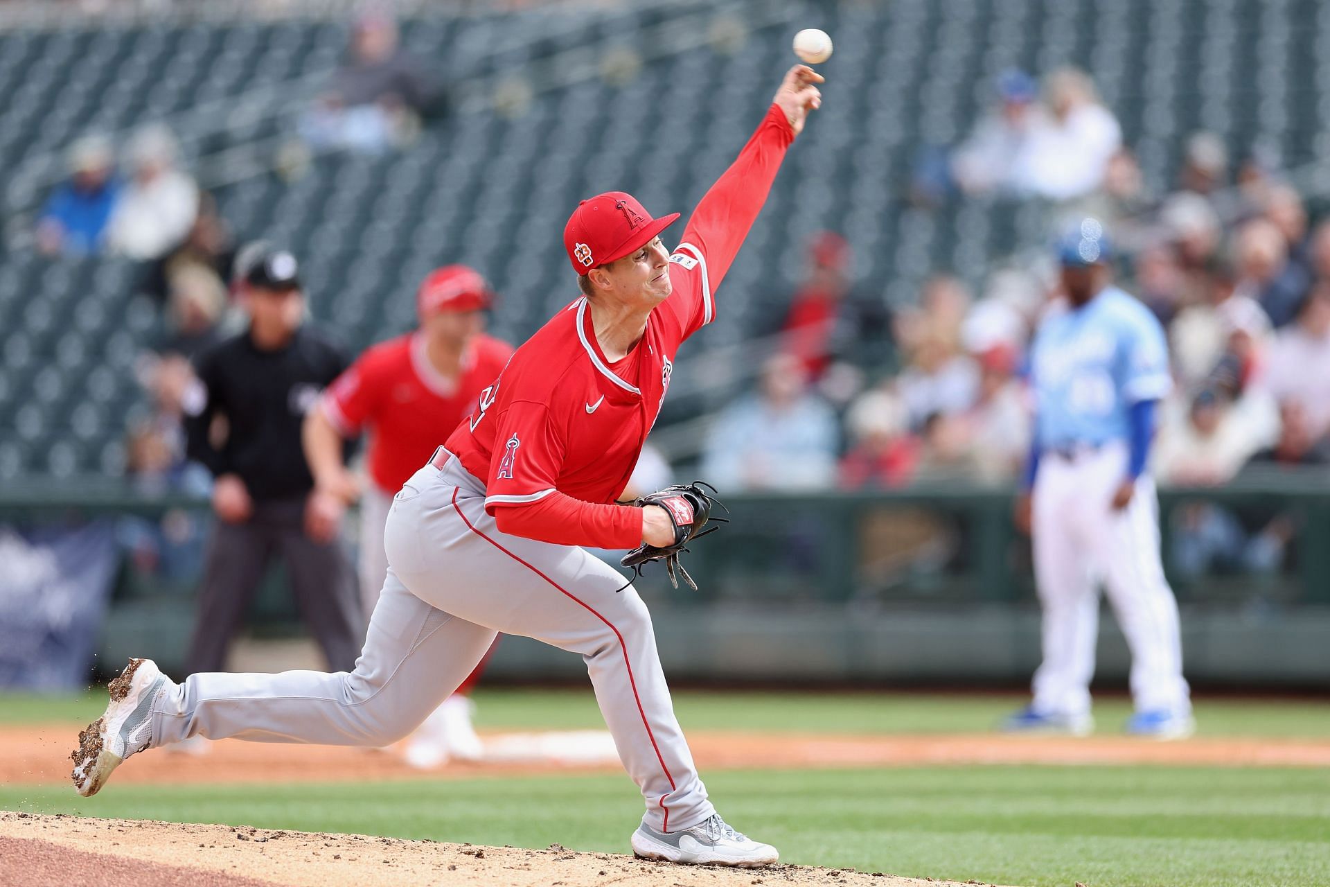 Pitcher Tucker Davidson of the Los Angeles Angels pitches against the Kansas City Royals during a spring training game at Surprise Stadium