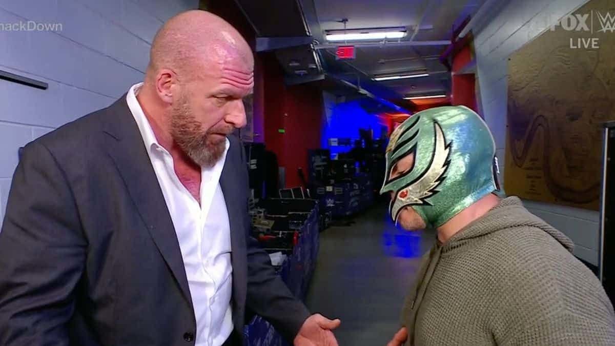 Rey Mysterio and WWE Legend Triple H