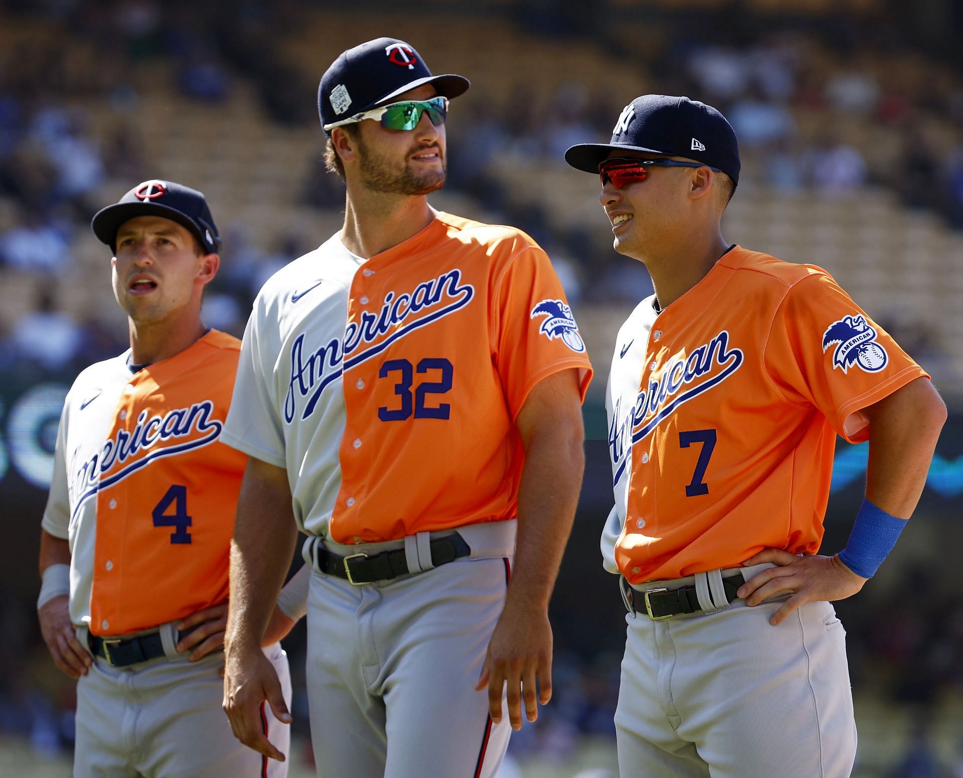 Spencer Steer, Matt Wallner and Anthony Volpe of the American League line up before the SiriusXM All-Star Futures Game at Dodger Stadium