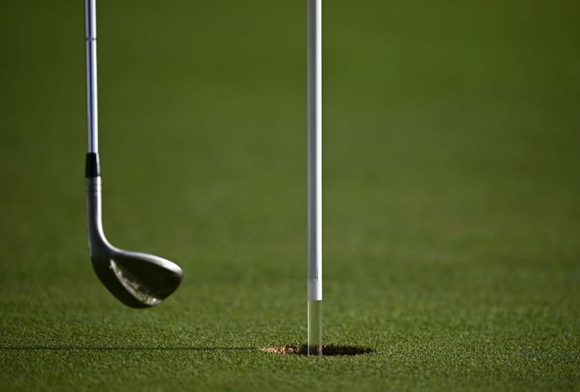 What is the significance of flags on a golf course?