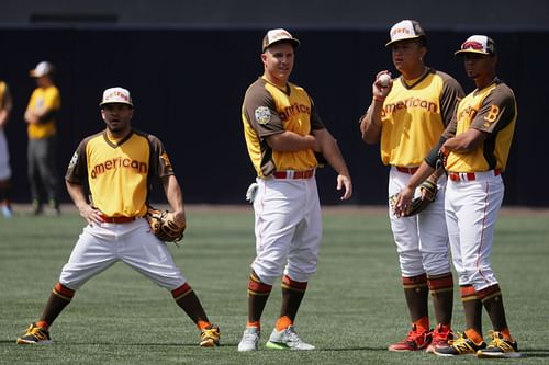 (L-R) Jose Altuve #27 of the Houston Astros, Mike Trout #27 of the Los Angeles Angels of Anaheim, Miguel Cabrera #24 of the Detroit Tigers and Mookie Betts #50 of the Boston Red Sox warm up during Gatorade All-Star Workout Day for the 87th Annual MLB All-Star game at PETCO Park on July 11, 2016 in San Diego, California.