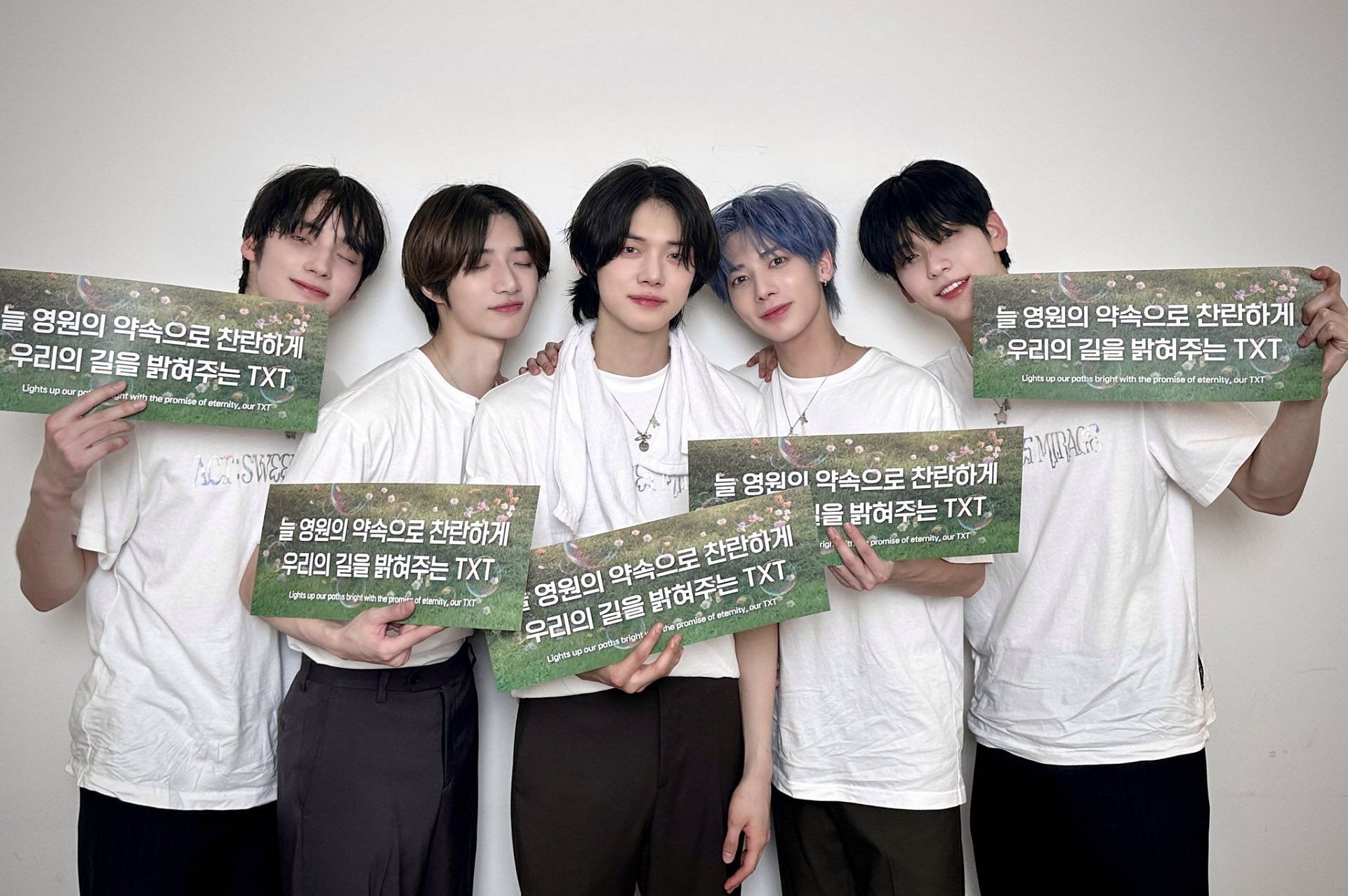 K-pop group TXT poses after their Seoul concert, which was the first stop of their world tour.