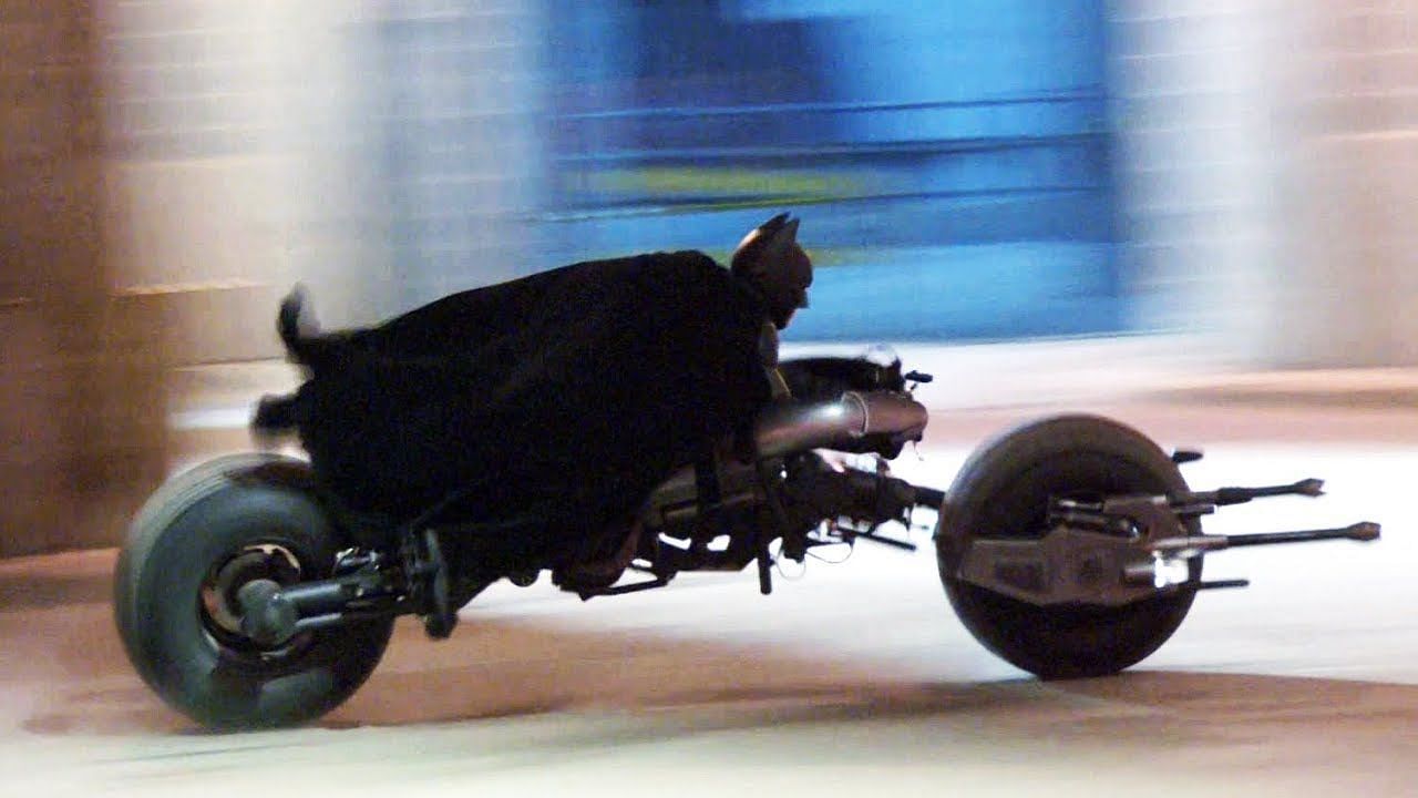 A unique, high-speed motorcycle with an aggressive design, the vehicle features two large wheels and a powerful engine (Image via Warner Bros)