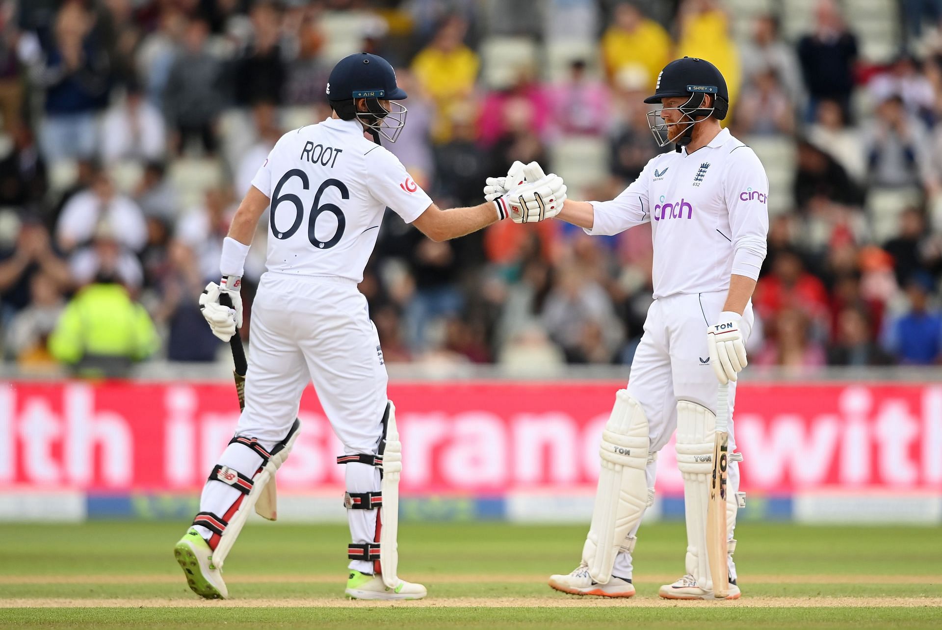 Jonny Bairstow and Joe Root shake hands during their match-winning partnership in the 5th Test.