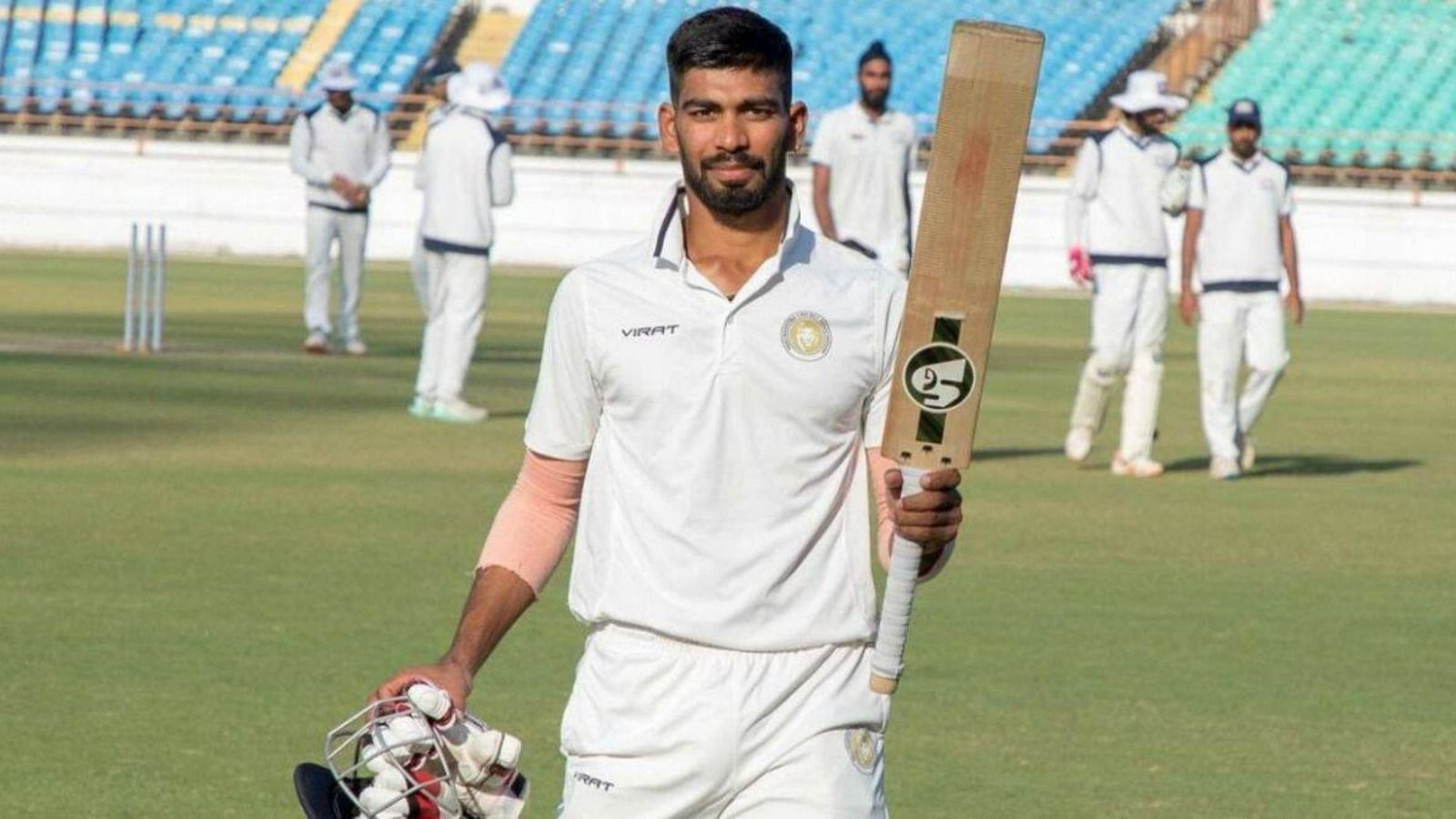 Parth Bhut celebrates after scoring a hundred against Punjab (P.C.:Twitter)