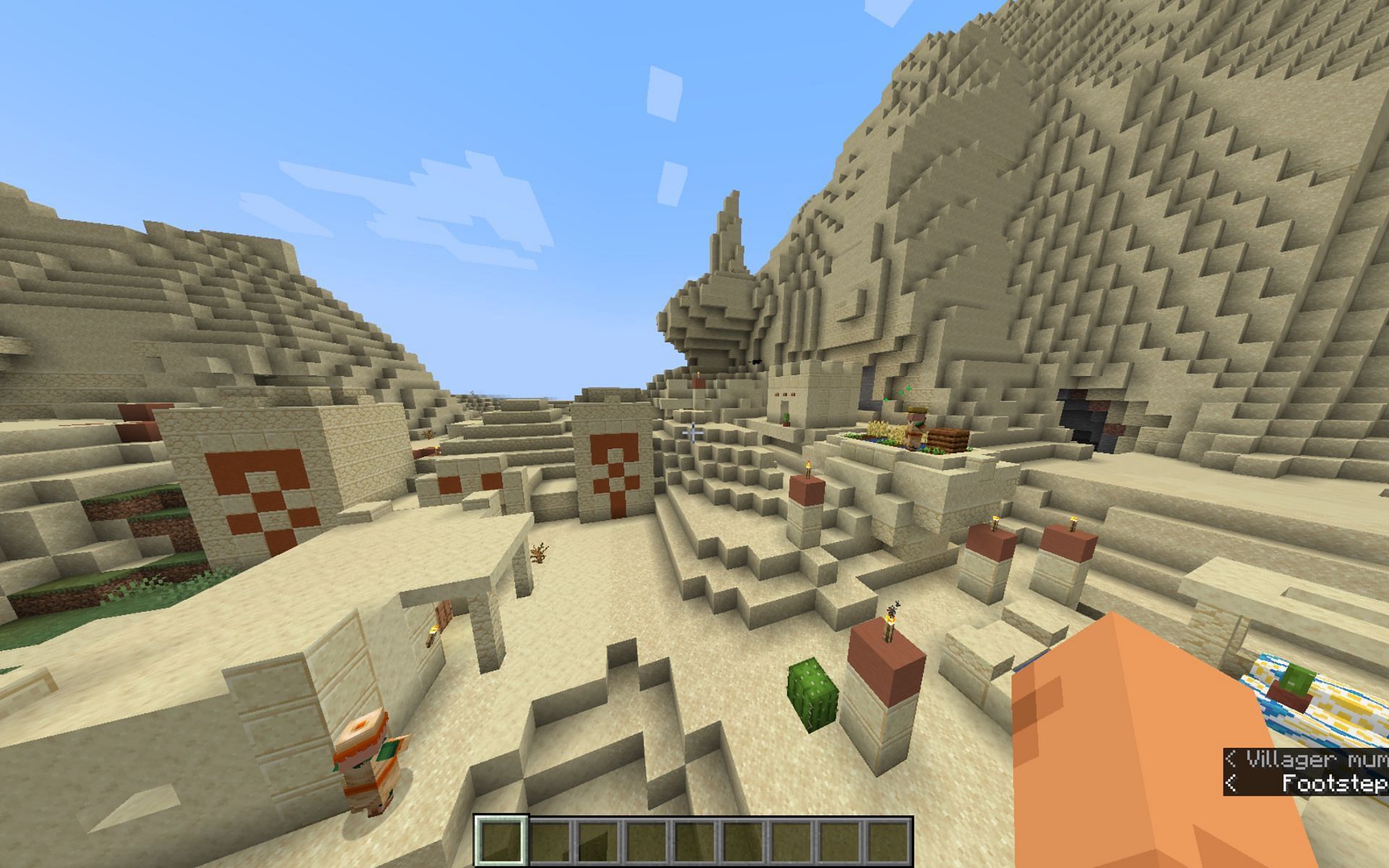 A desert temple near a village in this seed (Image via Mojang)