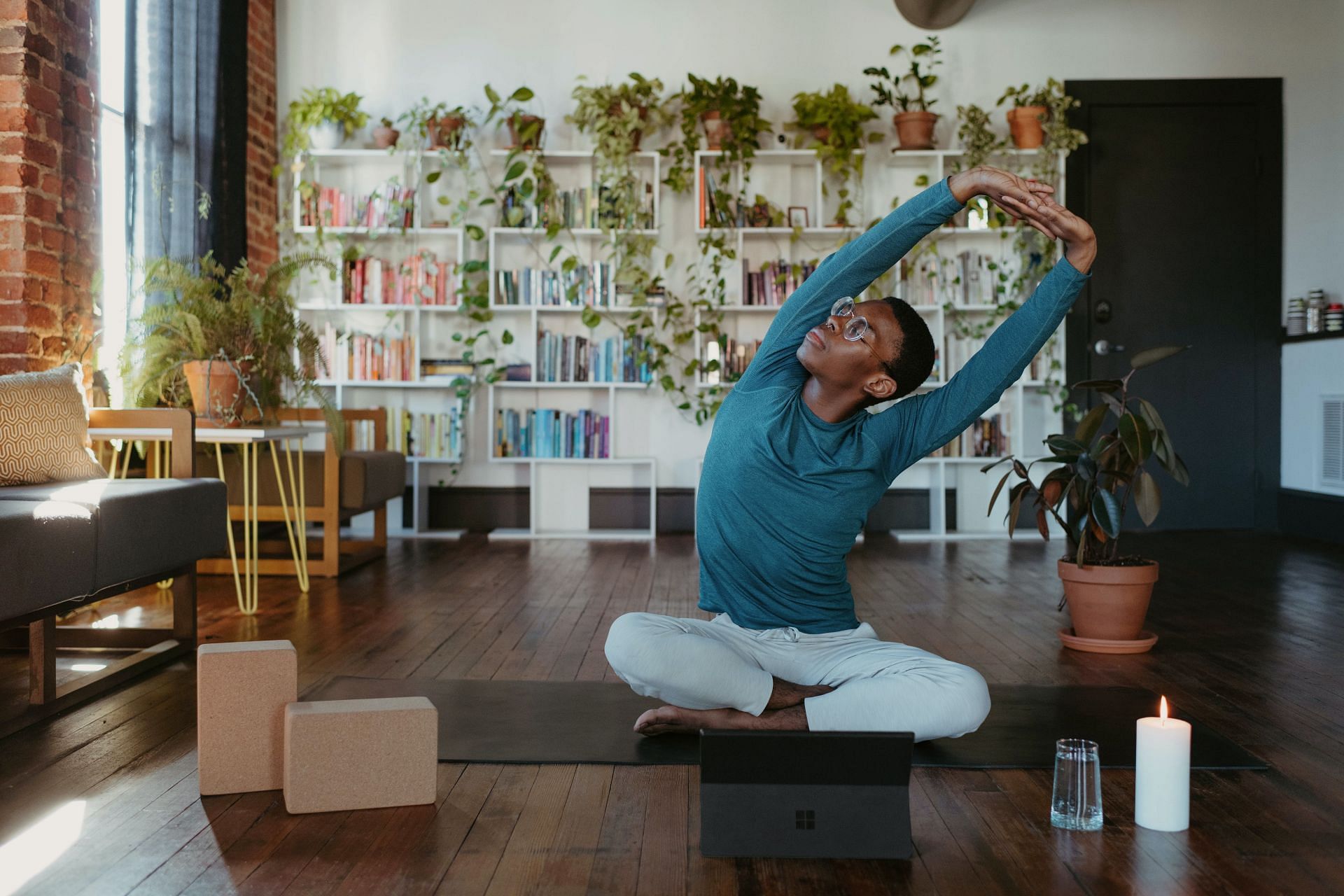 You can perform these stretches at anywhere. (Image via Unsplash/Surface