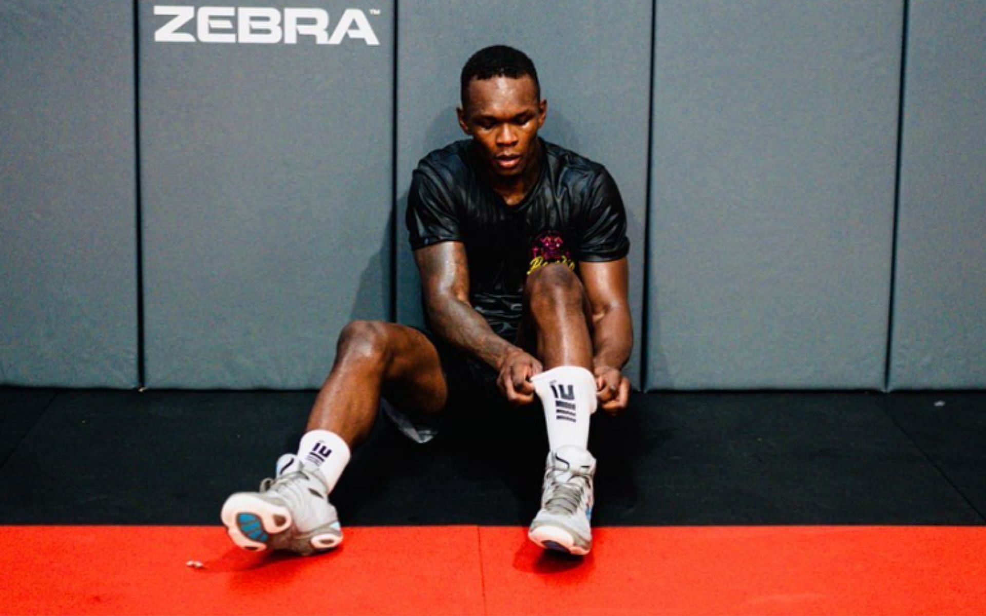 Israel Adesanya [via @stylebender on Instagram]