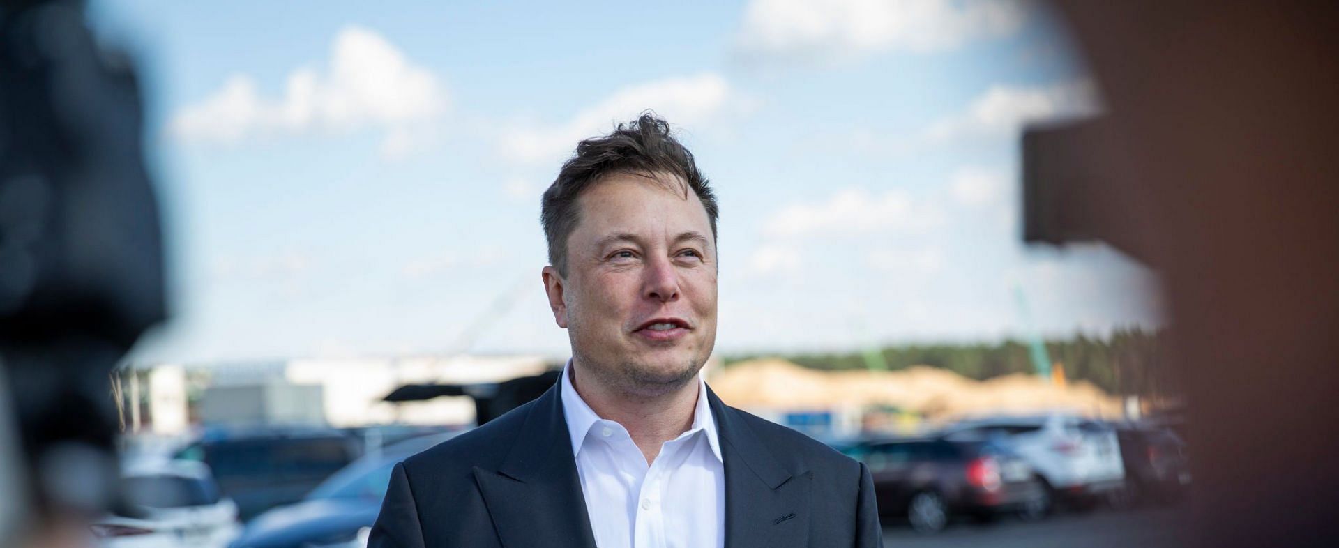 Netizens called out Elon Musk for mocking and firing designer Halli Thorleifsson (Image via Getty Images)