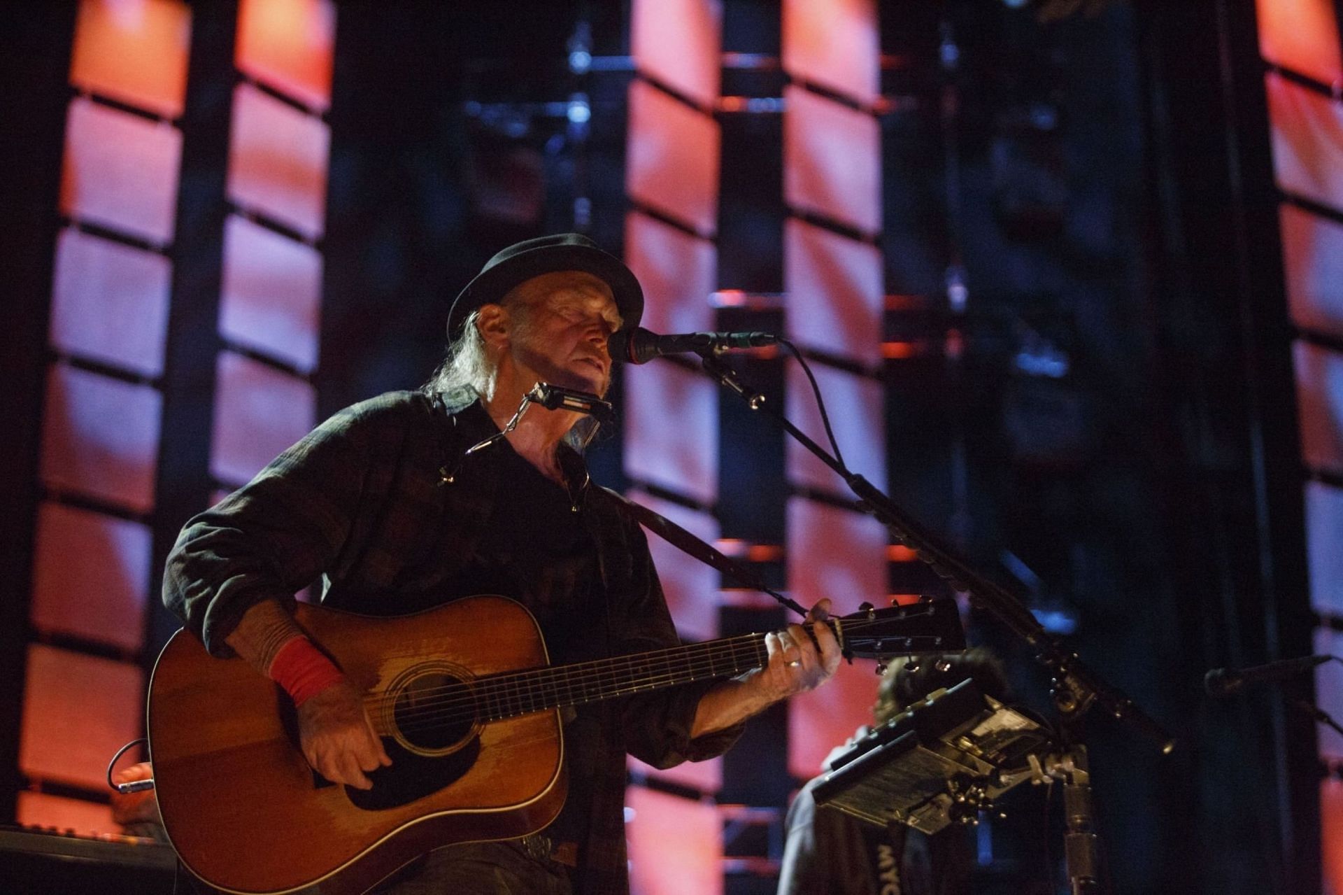 Neil Young performs during the Farm Aid festival in East Troy, Wisconsin, U.S., on Saturday, Sept. 21, 2019.(Image via Getty images)