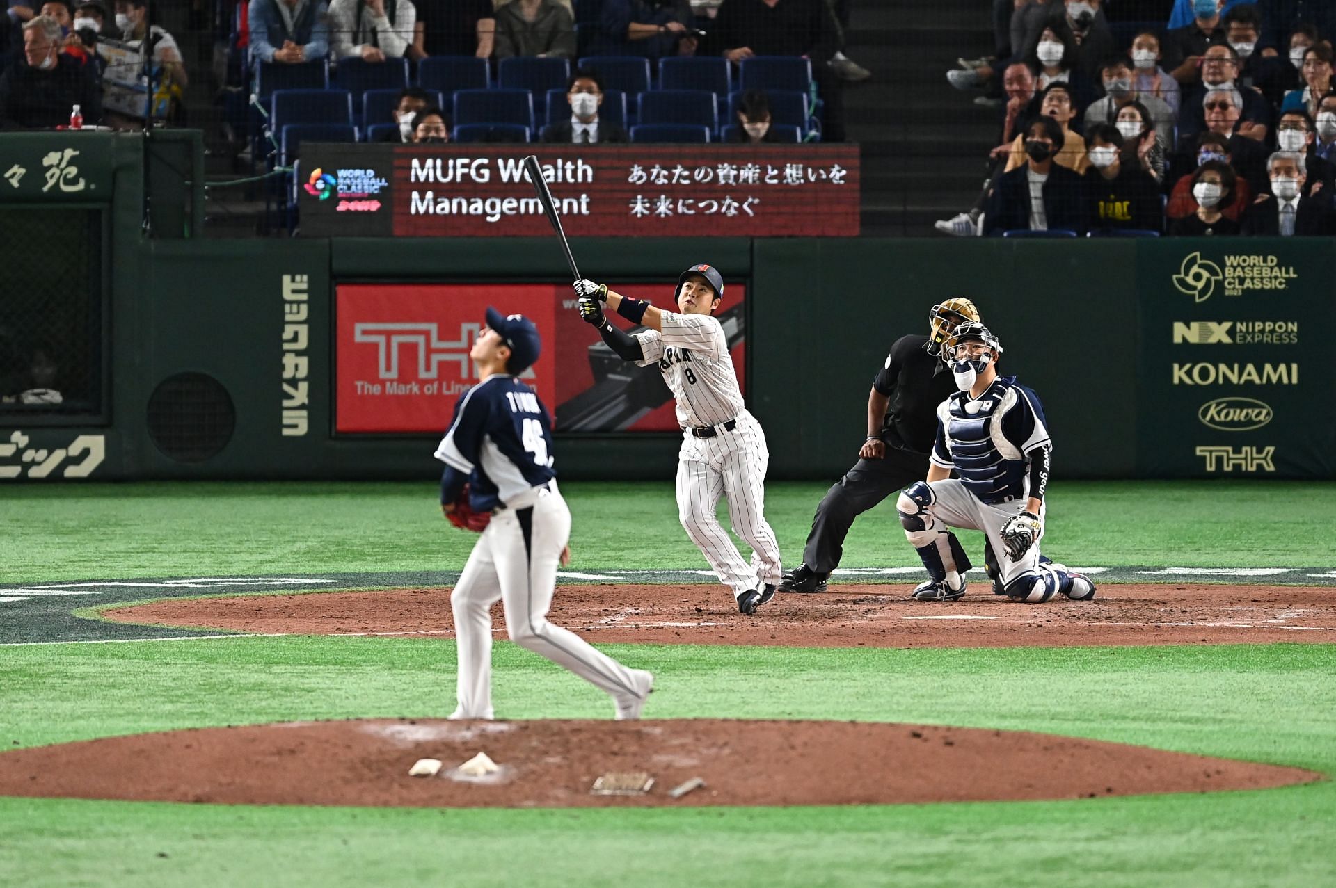 Kensuke Kondoh hits a solo home run to make it 3-5 in the fifth inning during the game between Korea and Japan at Tokyo Dome