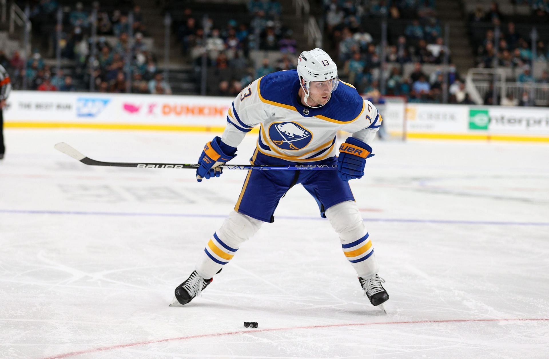 Mark Pysyk #13 in action with the Buffalo Sabres against the San Jose Sharks