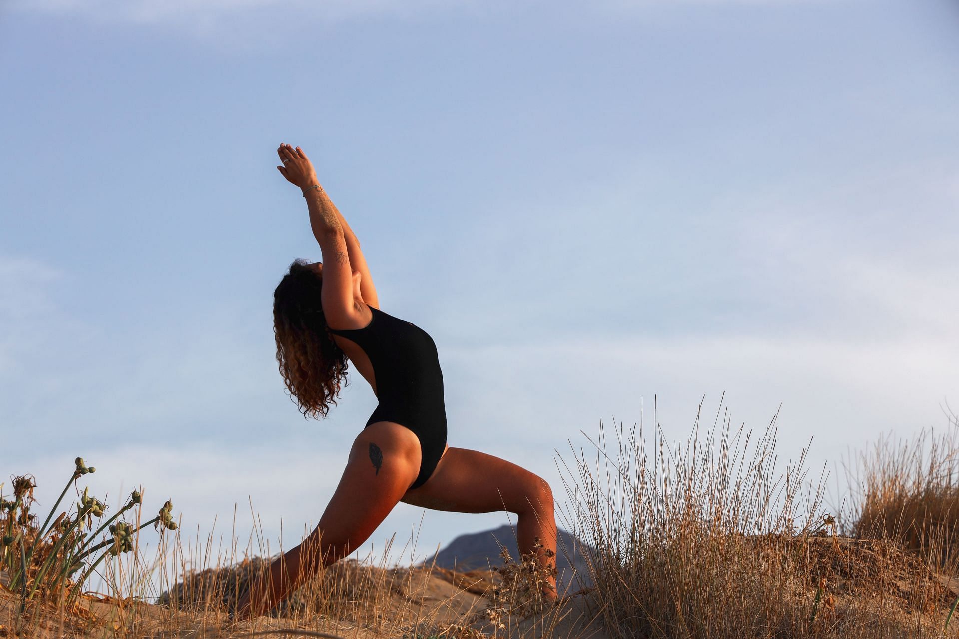 Yoga for height asanas can also improve your posture and balance. (Image via Unsplash / Mor Shani)