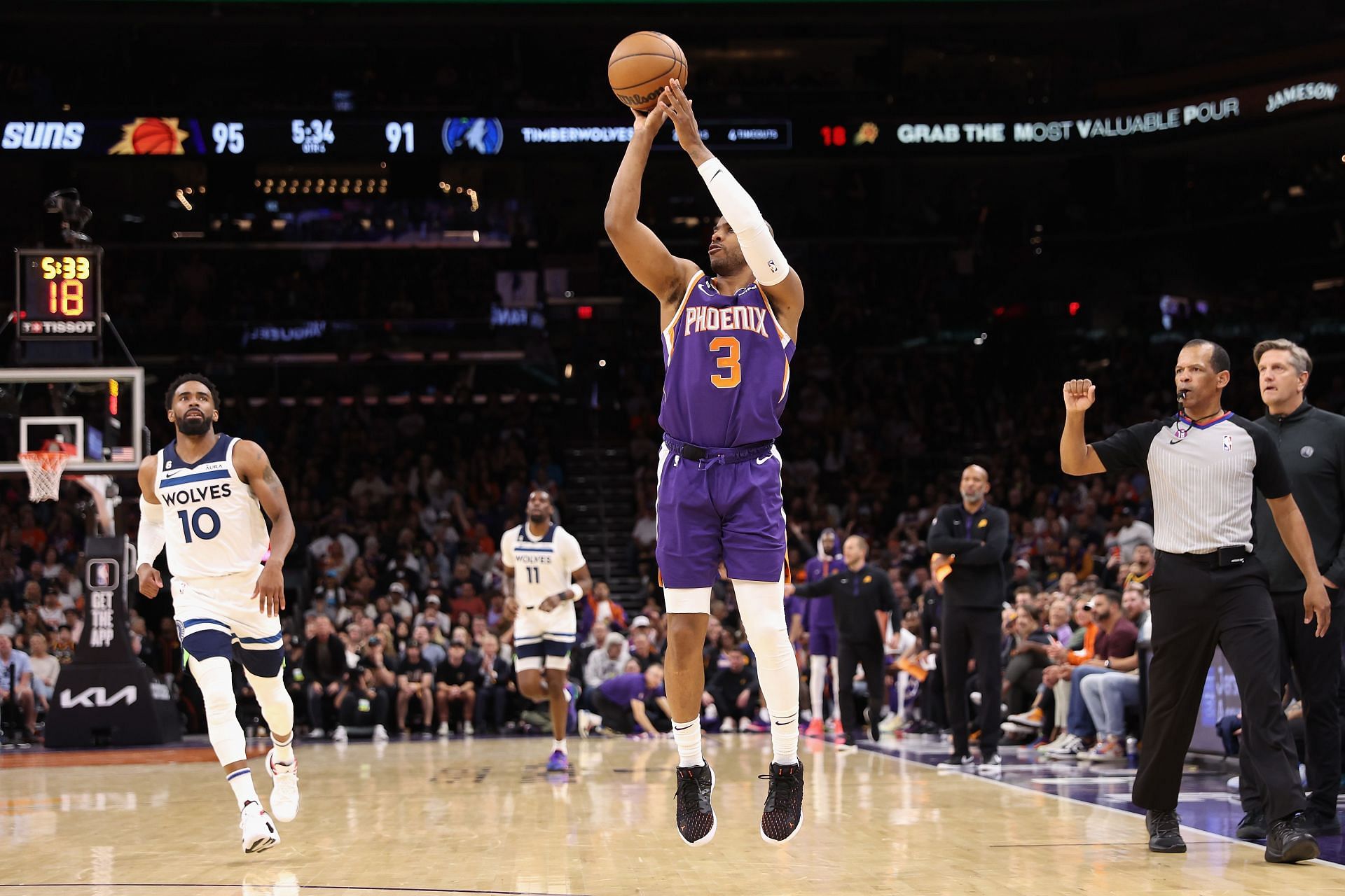 Chris Paul #3 of the Phoenix Suns attempts a three-point shot against the Minnesota Timberwolves