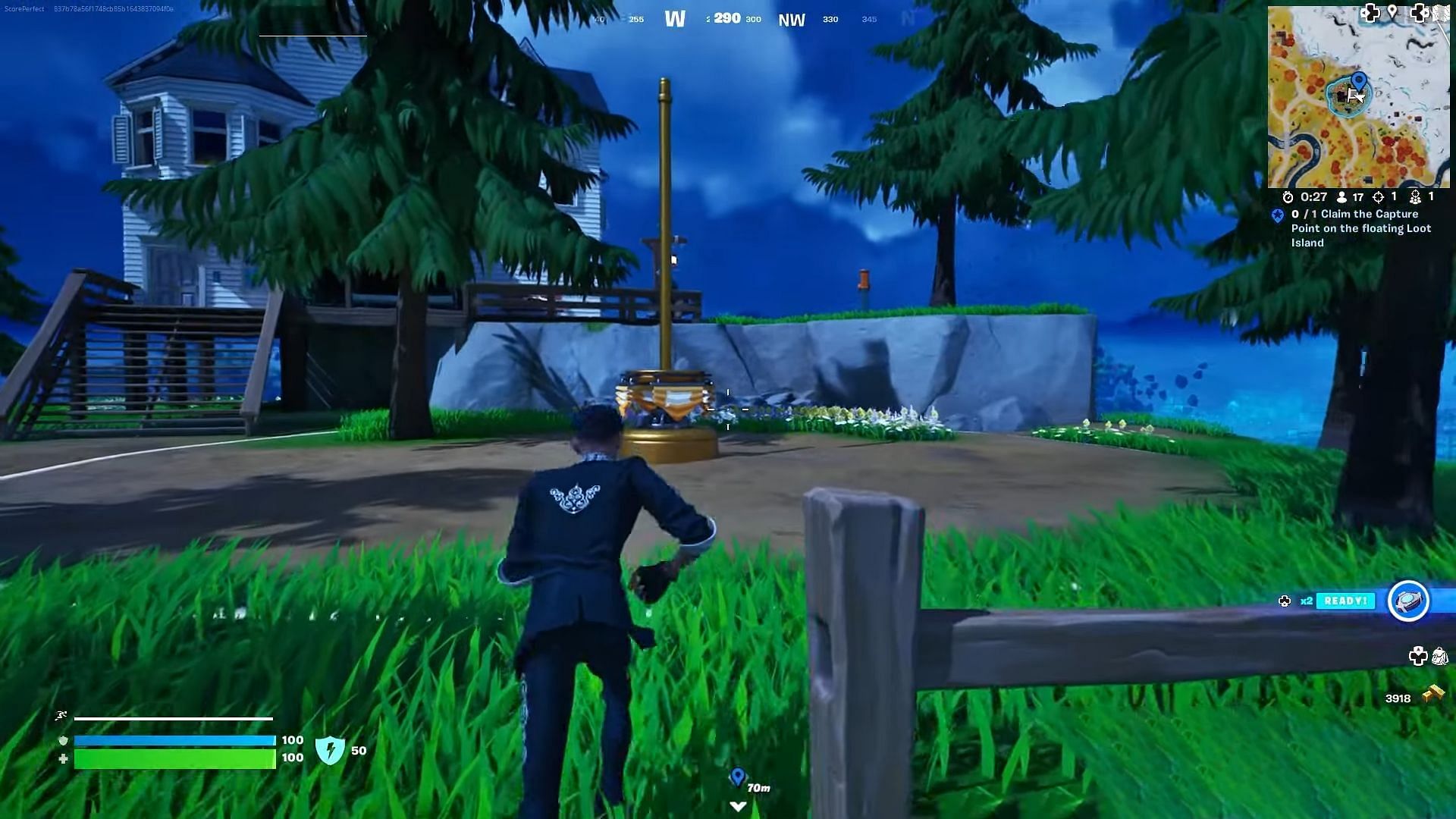 The Capture Point is located right in front of the house on the island (Image via Epic Games)