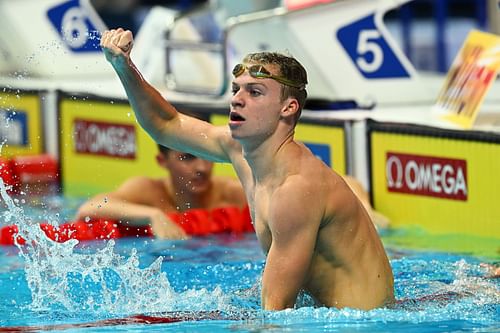 Leon Marchand of Team France celebrates after winning Gold in the Men's 400m Medley Final on day one of the Budapest 2022 FINA World Championships.