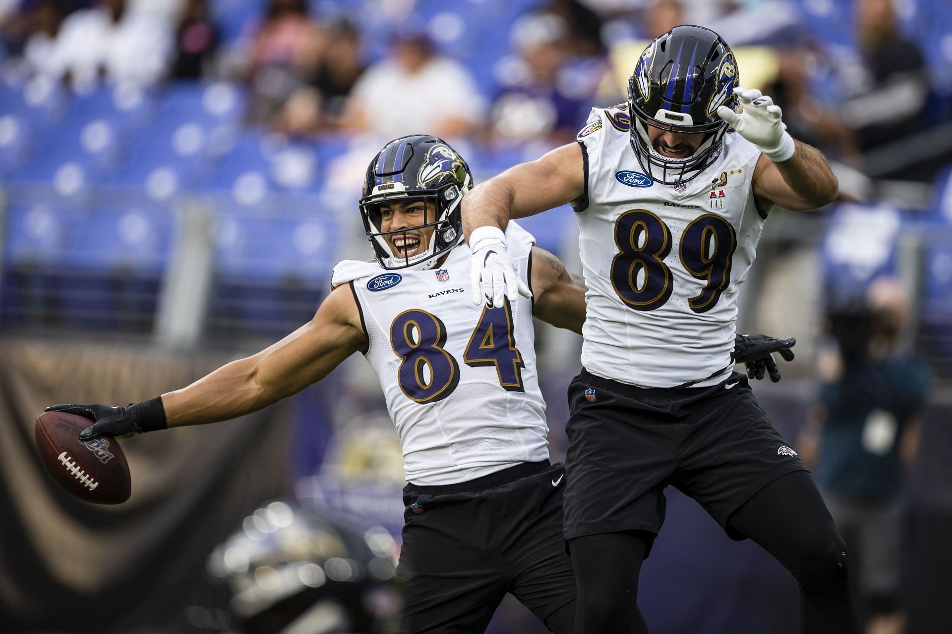 Josh Oliver #84 and Mark Andrews #89 of the Baltimore Ravens celebrate during training camp