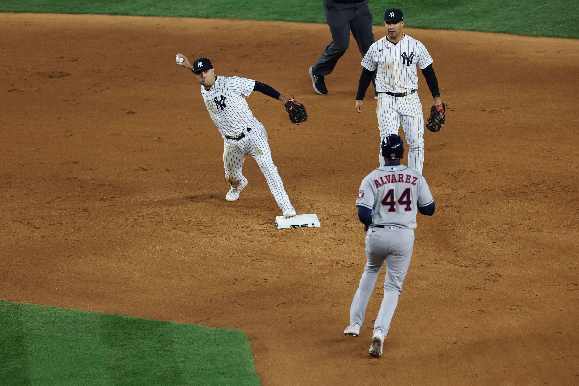 Isiah Kiner-Falefa turns a double play against the Houston Astros in game four of the ALCS at Yankee Stadium
