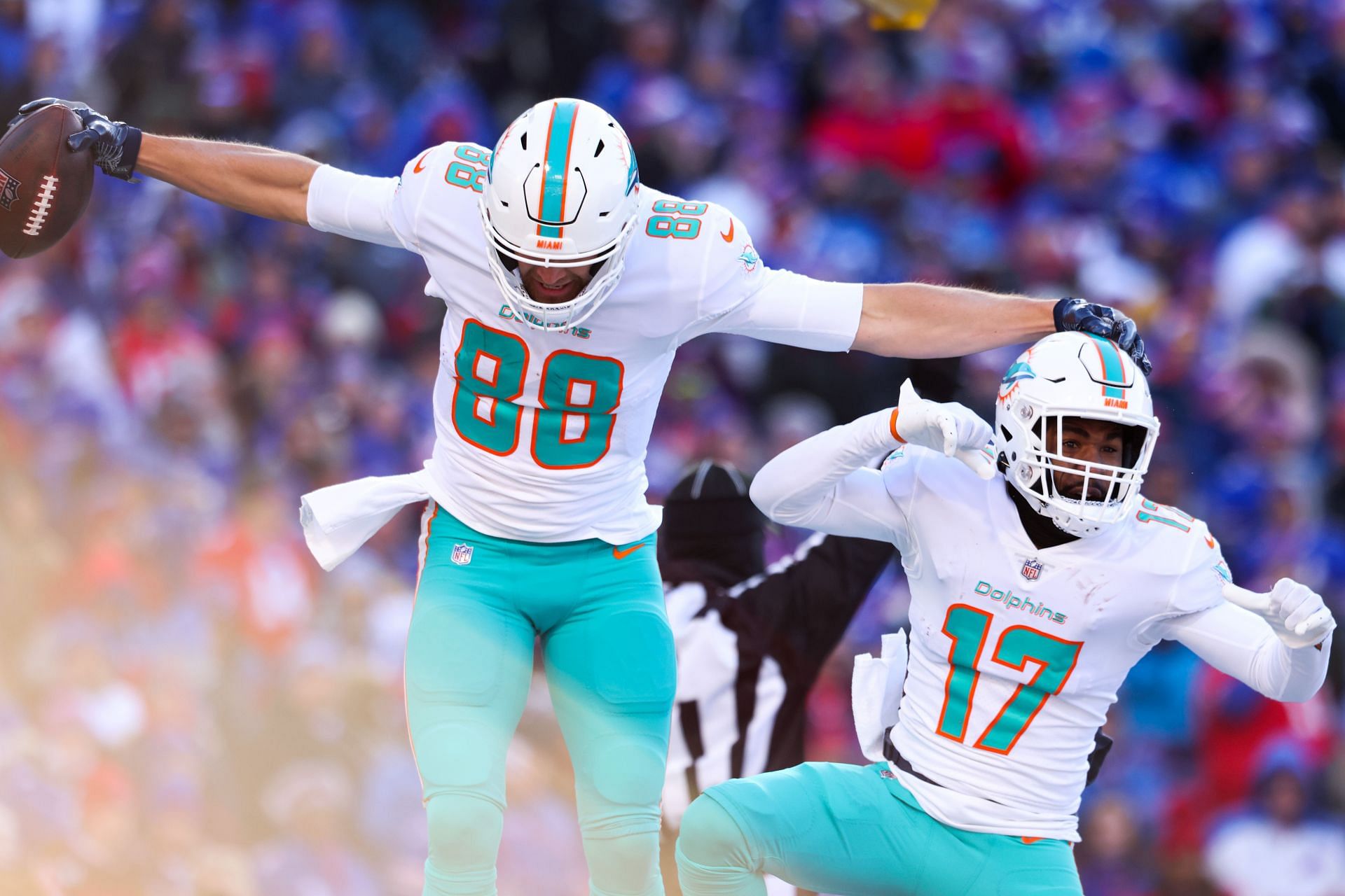 Mike Gesicki celebrates a touchdown - AFC Wild Card Playoffs - Miami Dolphins v Buffalo Bills