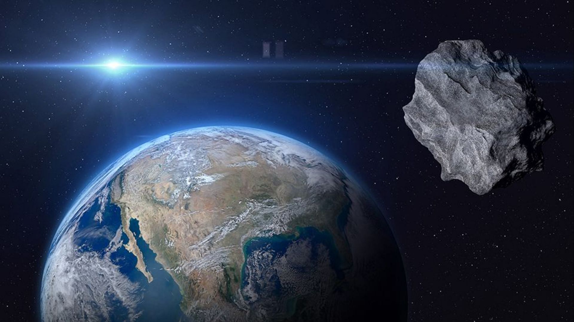 NASA claims a newly discovered asteroid named 2023 DZ2 will pass by our planet this weekend. (Image via Shutterstock)