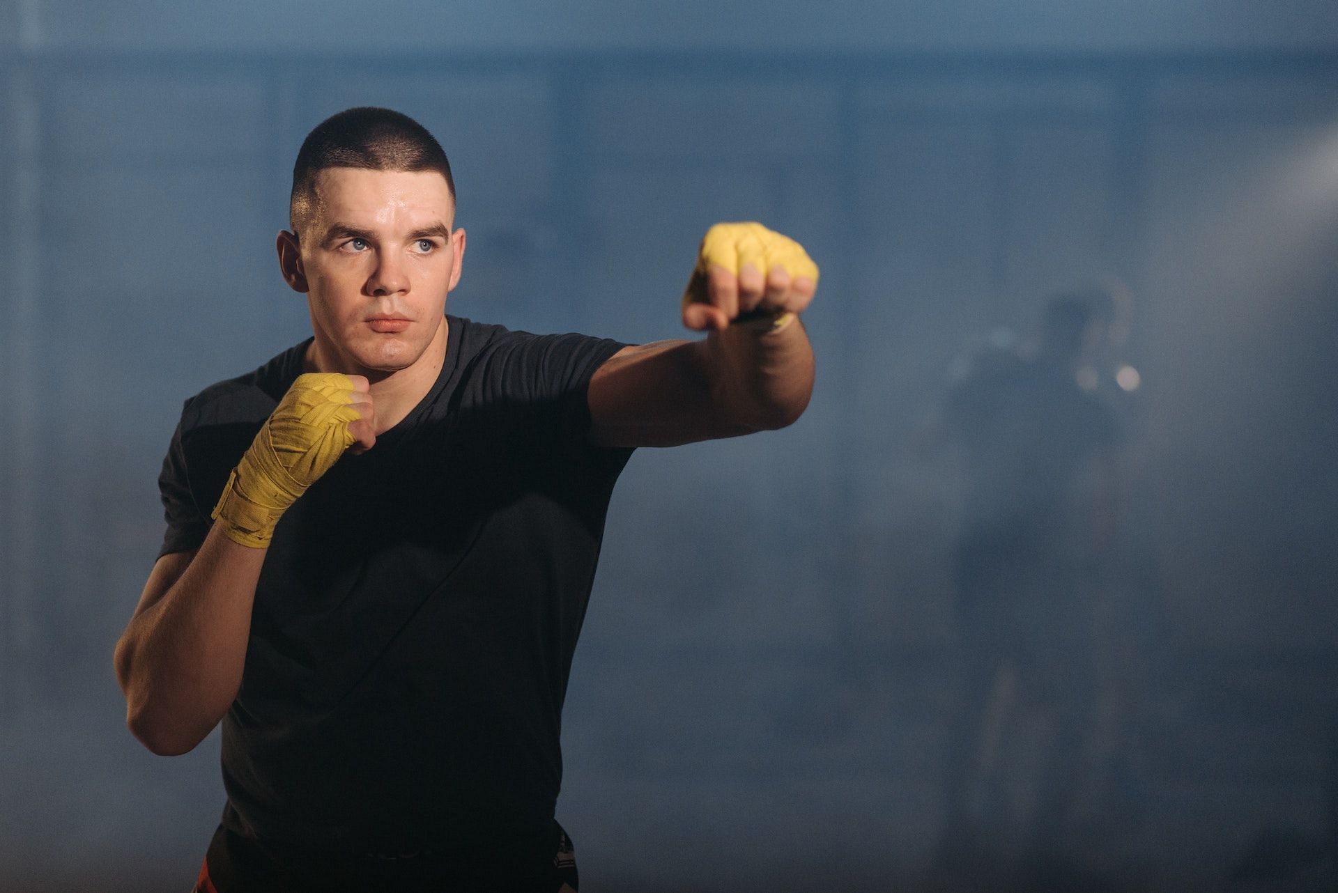 Single-leg cross body punches improve balance and strengthen the core. (Photo via Pexels/Pavel Danilyuk)