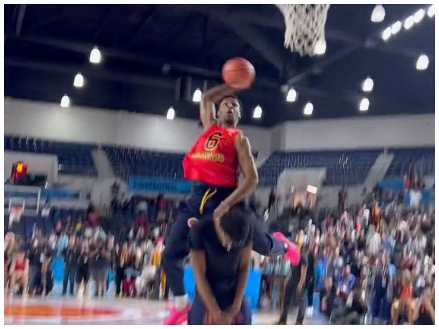 Bronny James jumps over Bryce James in the 2023 Powerade JamFest. 