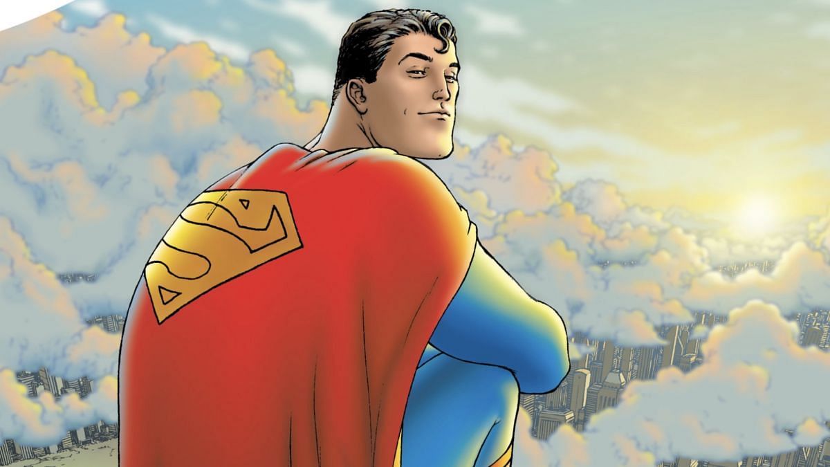 Superman soars through the clouds, cape billowing behind him (Image via DC Comics)