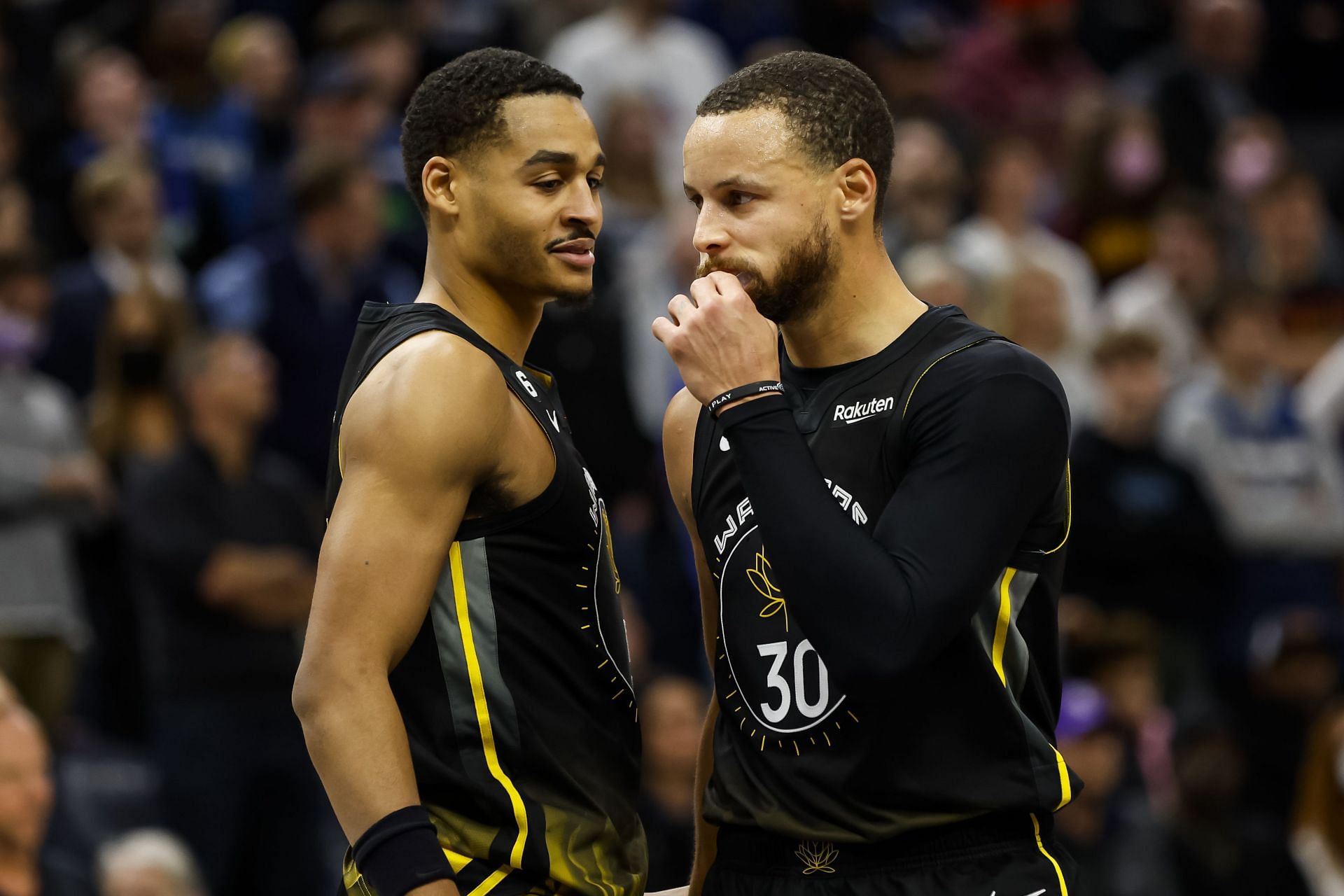 Jordan Poole and Steph Curry (right) of the Golden State Warriors