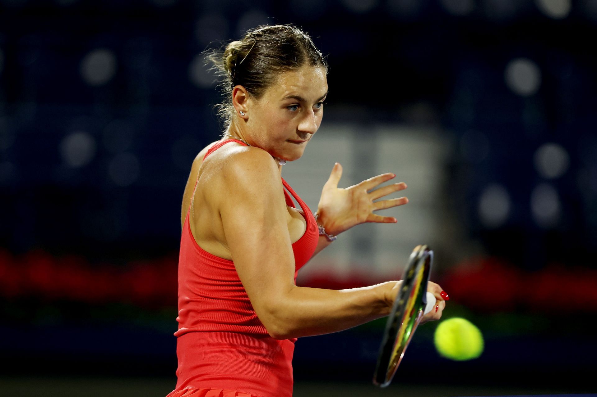 Marta Kostyuk in action at the Dubai Tennis Championships