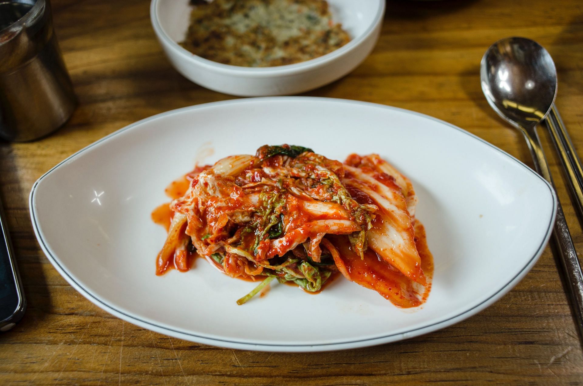 Kimchi contains different veggies. (Image via Pexels/ Makafood)