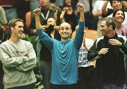 Andre Agassi (C) and Brad Gilbert (R)