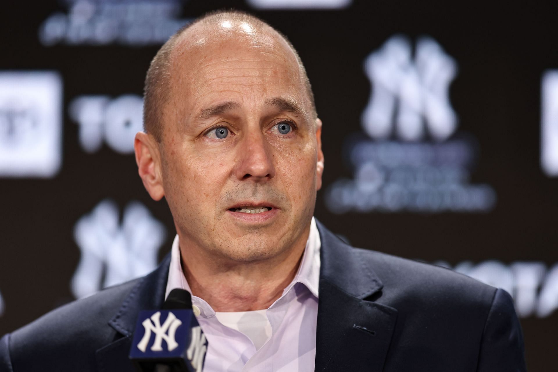 New York Yankee general manager Brian Cashman speaks to the media during a news conference.