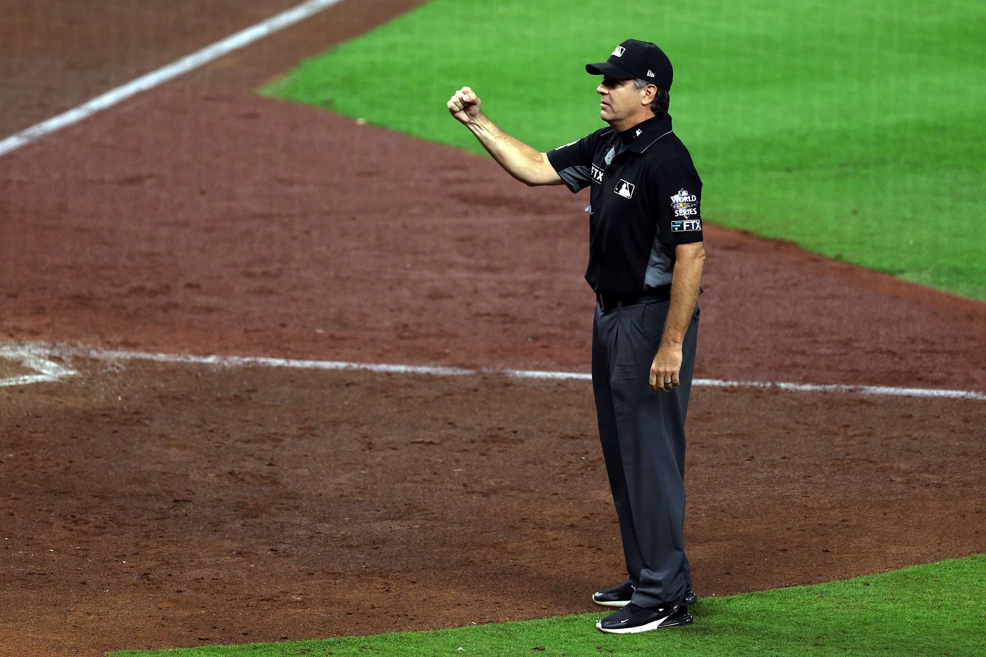 Umpire James Hoye confirms an out call in Game Two of the 2022 World Series at Minute Maid Park