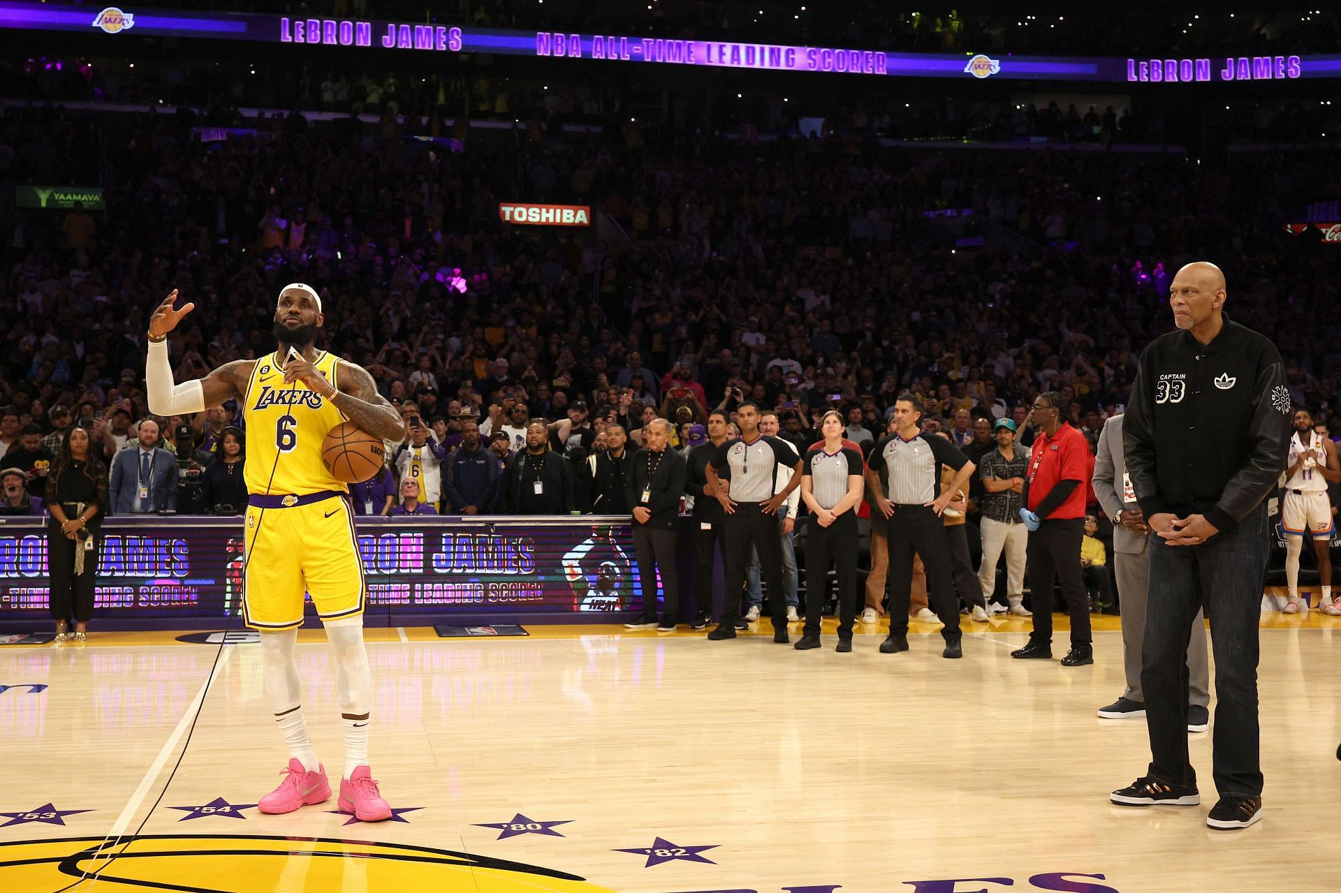 LeBron James, left, addresses the crowd after passing Kareem Abdul-Jabbar, right, to become the NBA&#039;s all-time scoring king in February.