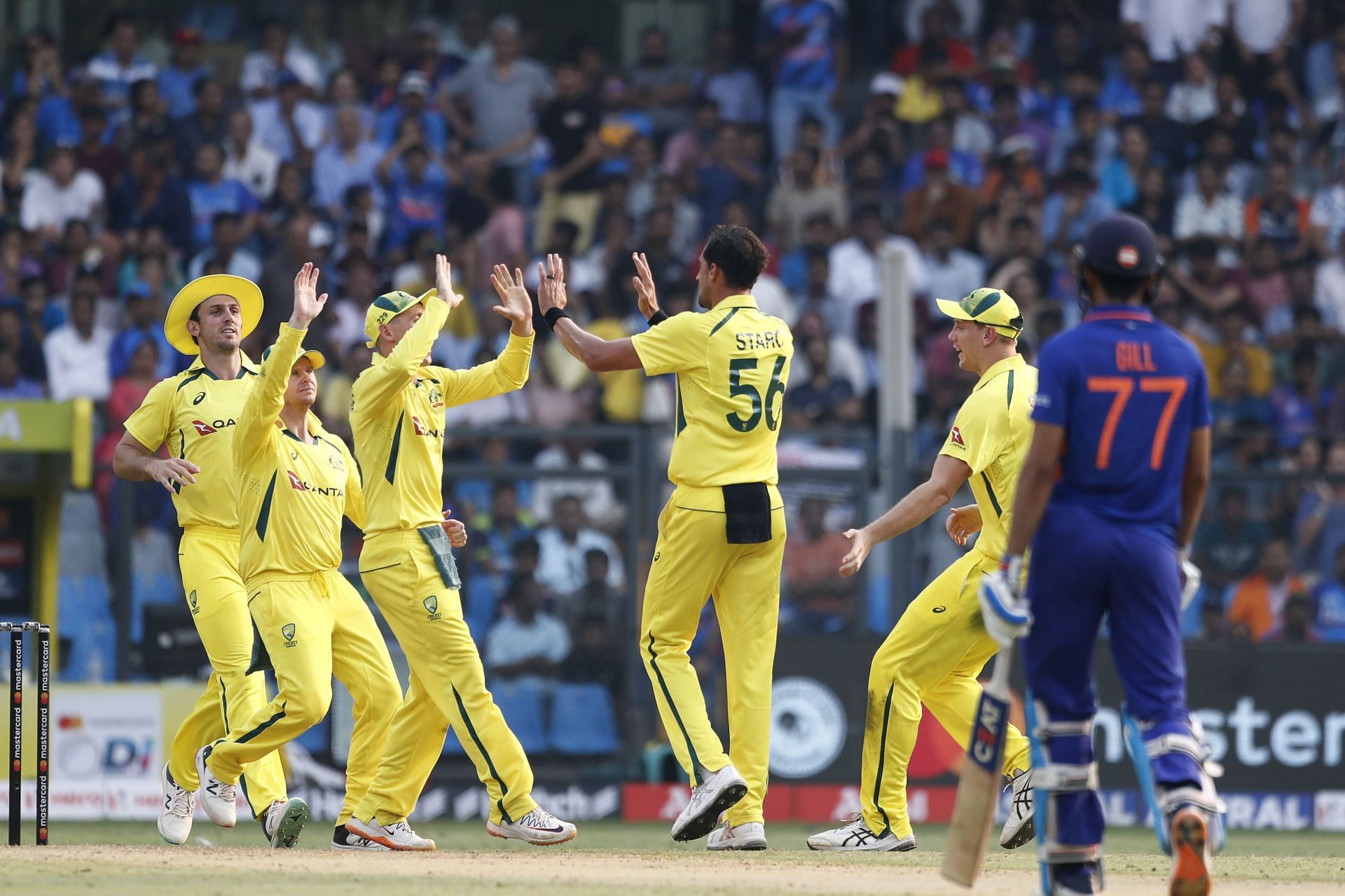 Australia celebrates Virat Kohli&#039;s wicket in the first ODI. (Credits: Getty)