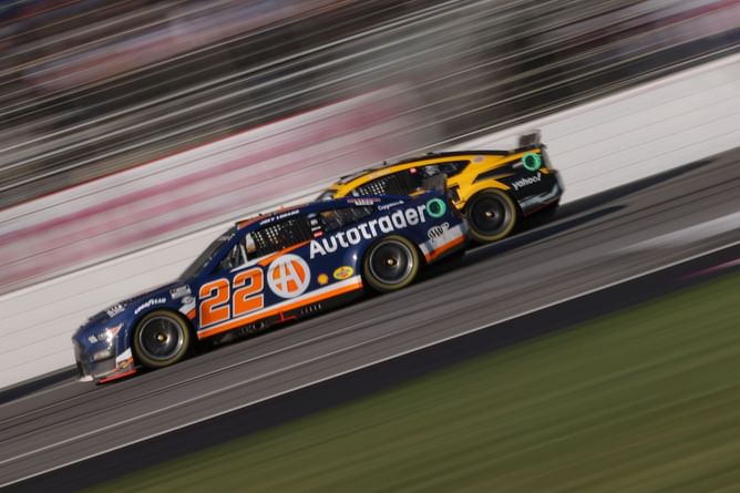 Joey Logano and Team Penske orchestrate brilliant last lap pass on Brad Keselowski to win at Atlanta