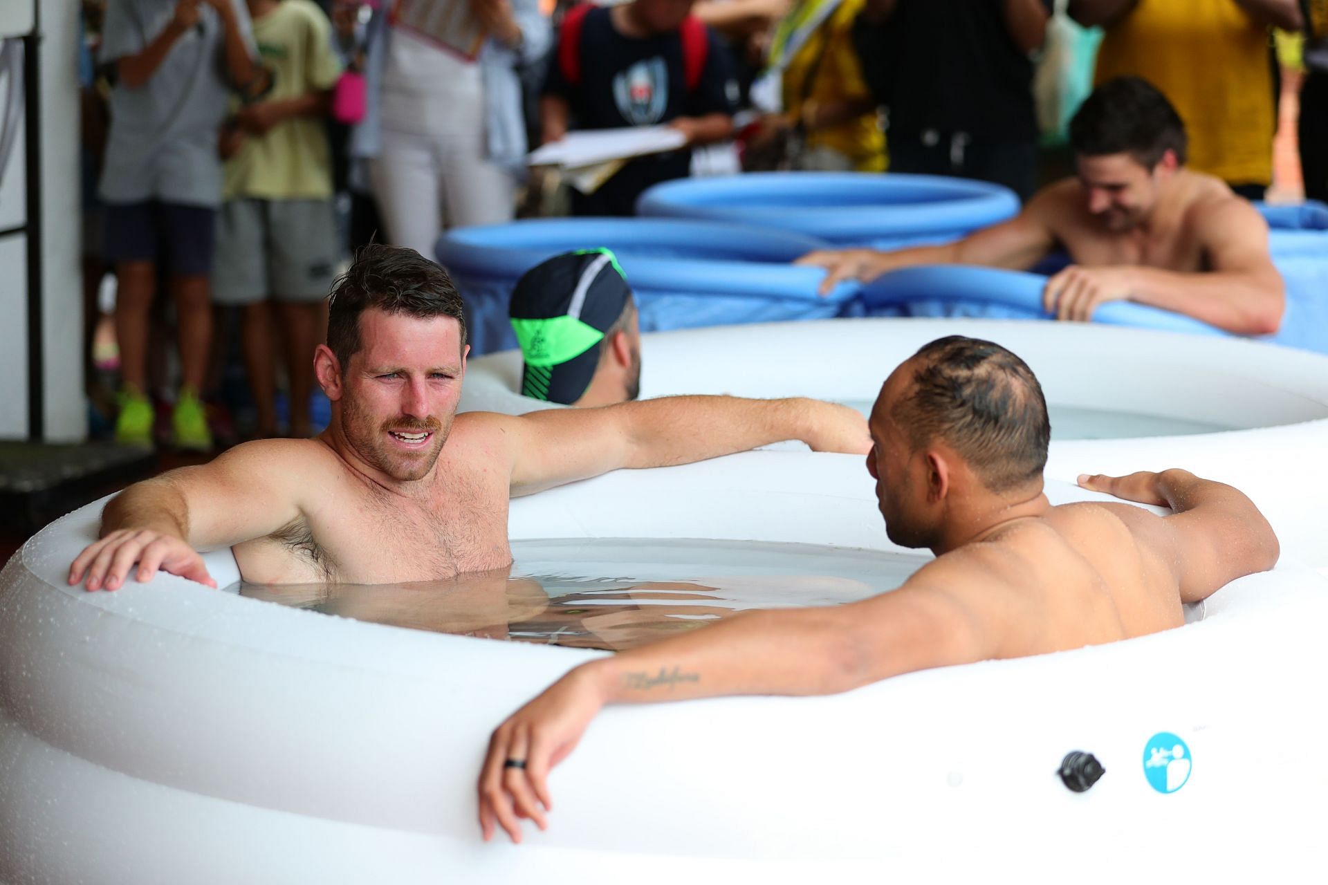 Players recovering in icebaths (Image via Getty)