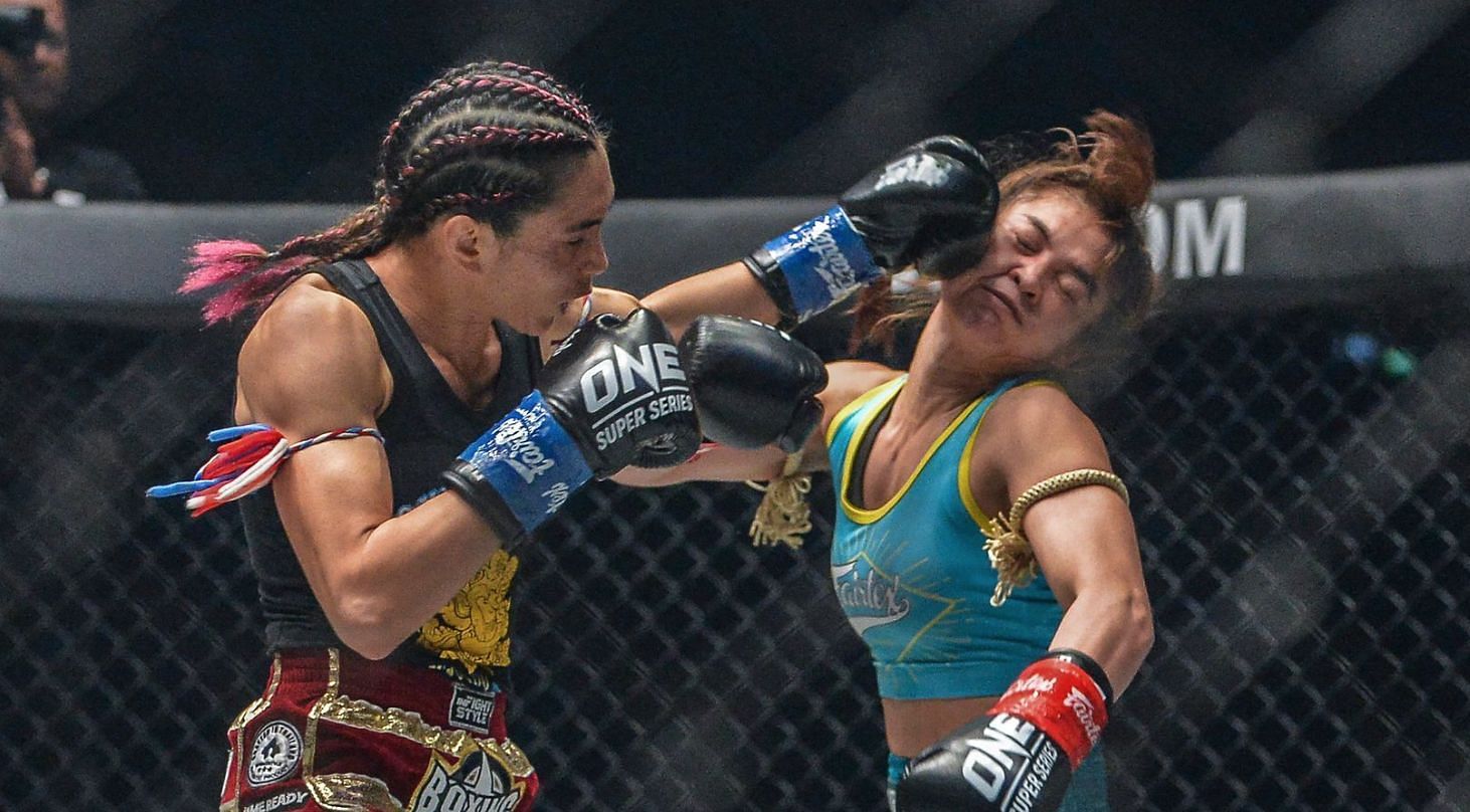 Janet Todd&#039;s (L) precise punches hit their mark in round 5, which sealed her victory over Stamp Fairtex (R). | Photo by ONE Championship