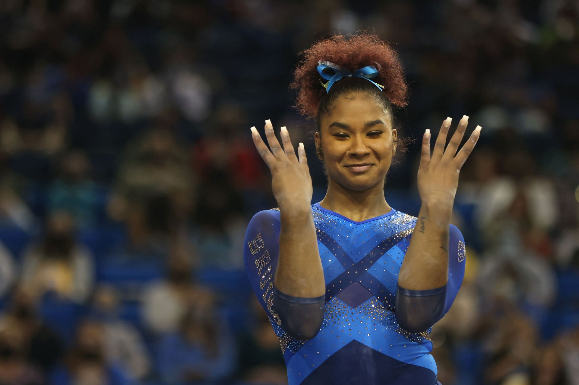 Jordan Chiles competes on beam against the Arizona Wildcats at UCLA Pauley Pavilion on January 30, 2022 in Los Angeles, California.