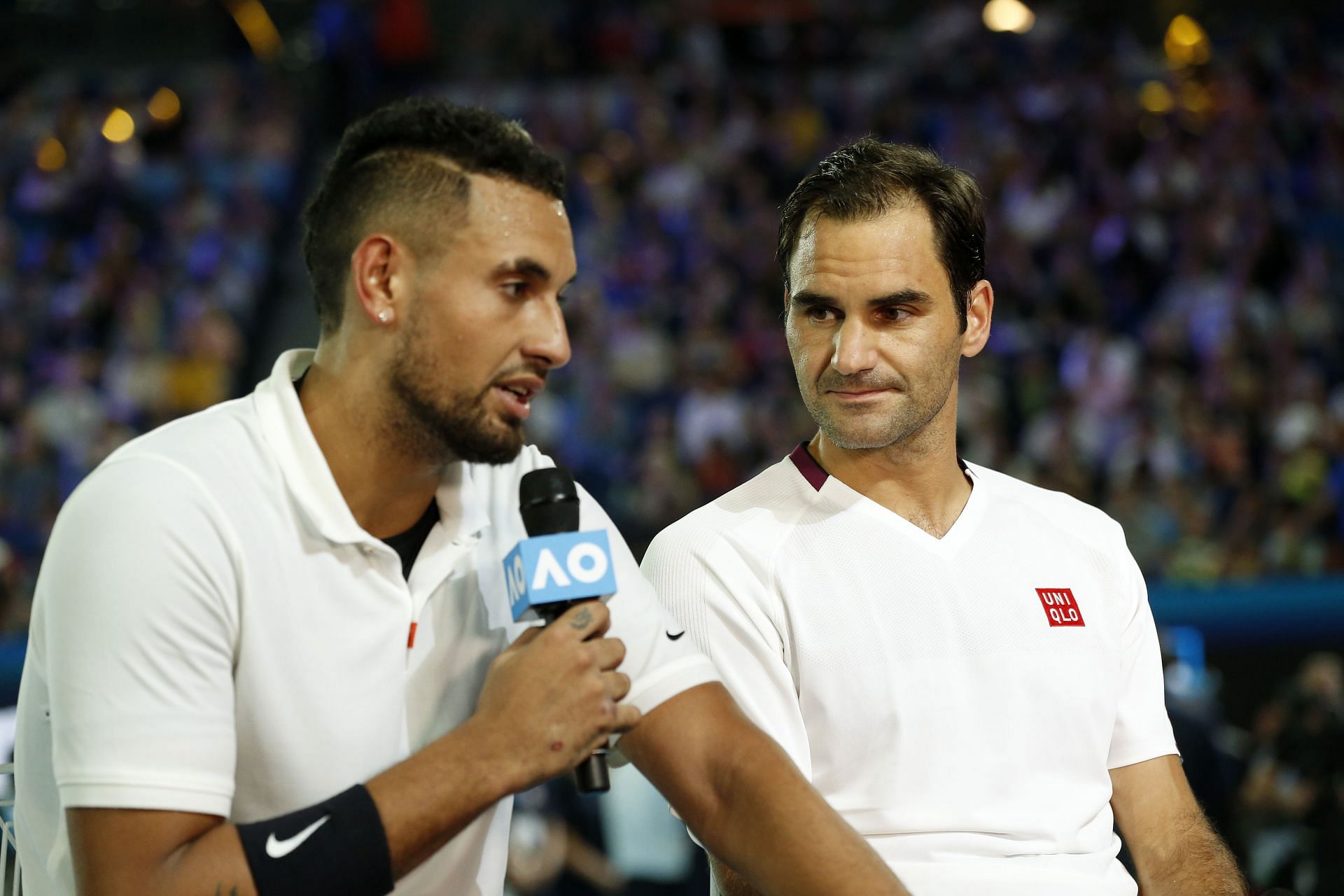 The Ausssie and the Swiss during the 2020 Tennis Rally for Relief at the Australian Open