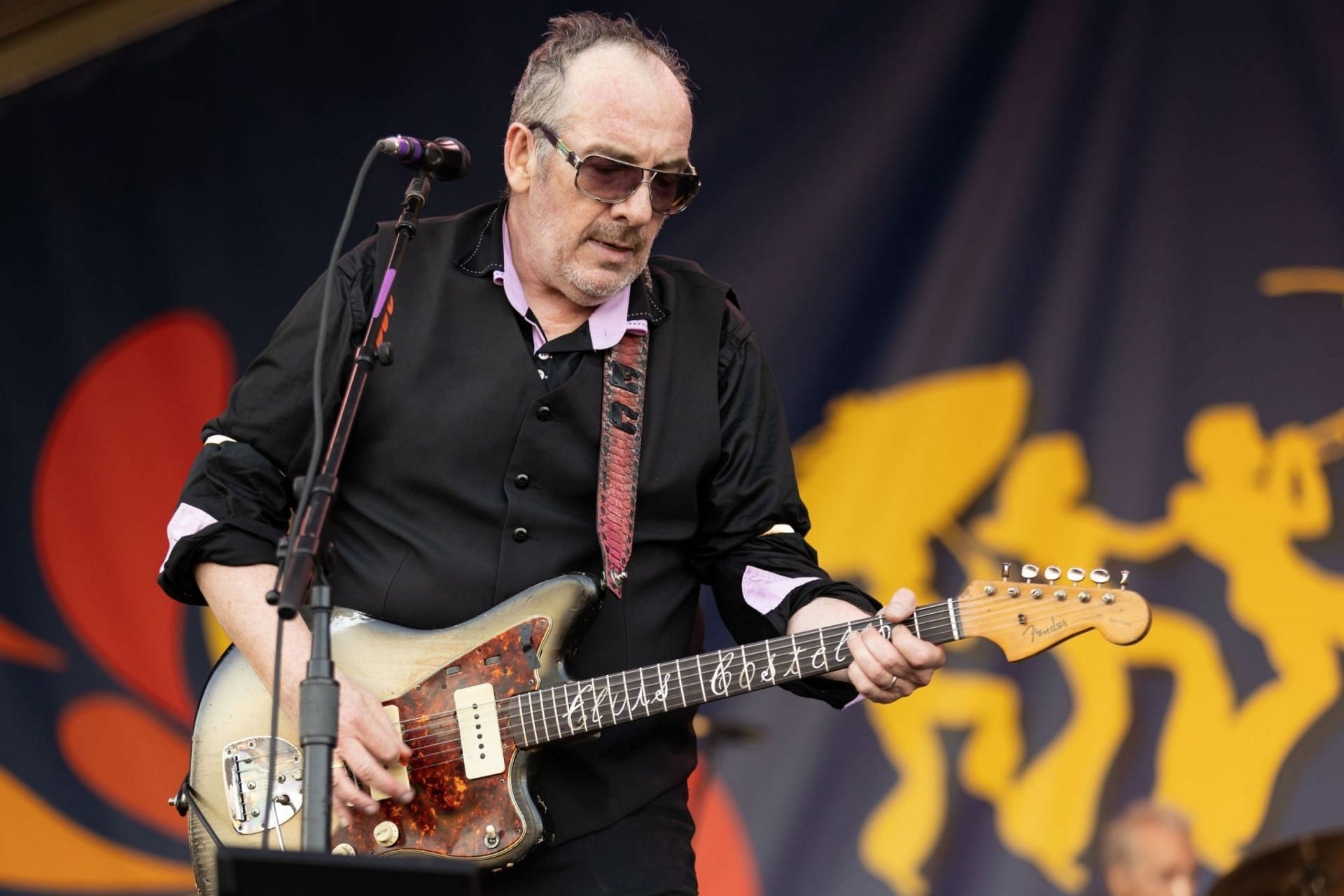 Elvis Castello at the 2022 New Orleans Jazz &amp; Heritage Festival at the Fair Grounds Race Course on May 06, 2022 in New Orleans, Louisiana (Image via Getty Images)