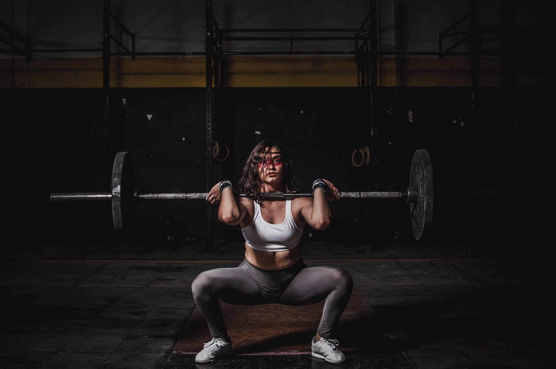 Front squats are among the most effective quad workouts. (Photo via Pexels/Leon Ardho)