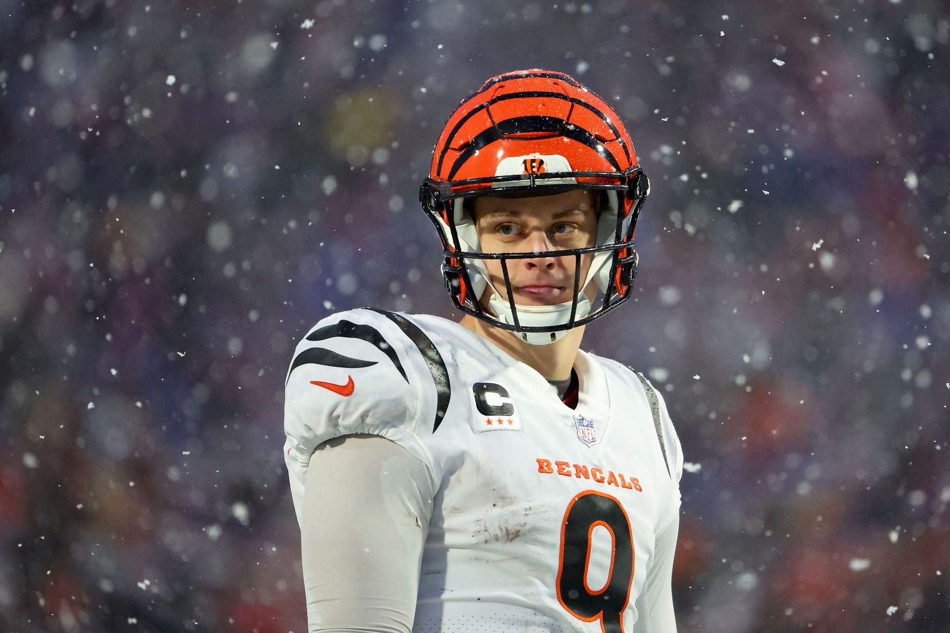 Joe Burrow #9 of the Cincinnati Bengals looks on against the Buffalo Bills in the AFC Divisional Playoff game